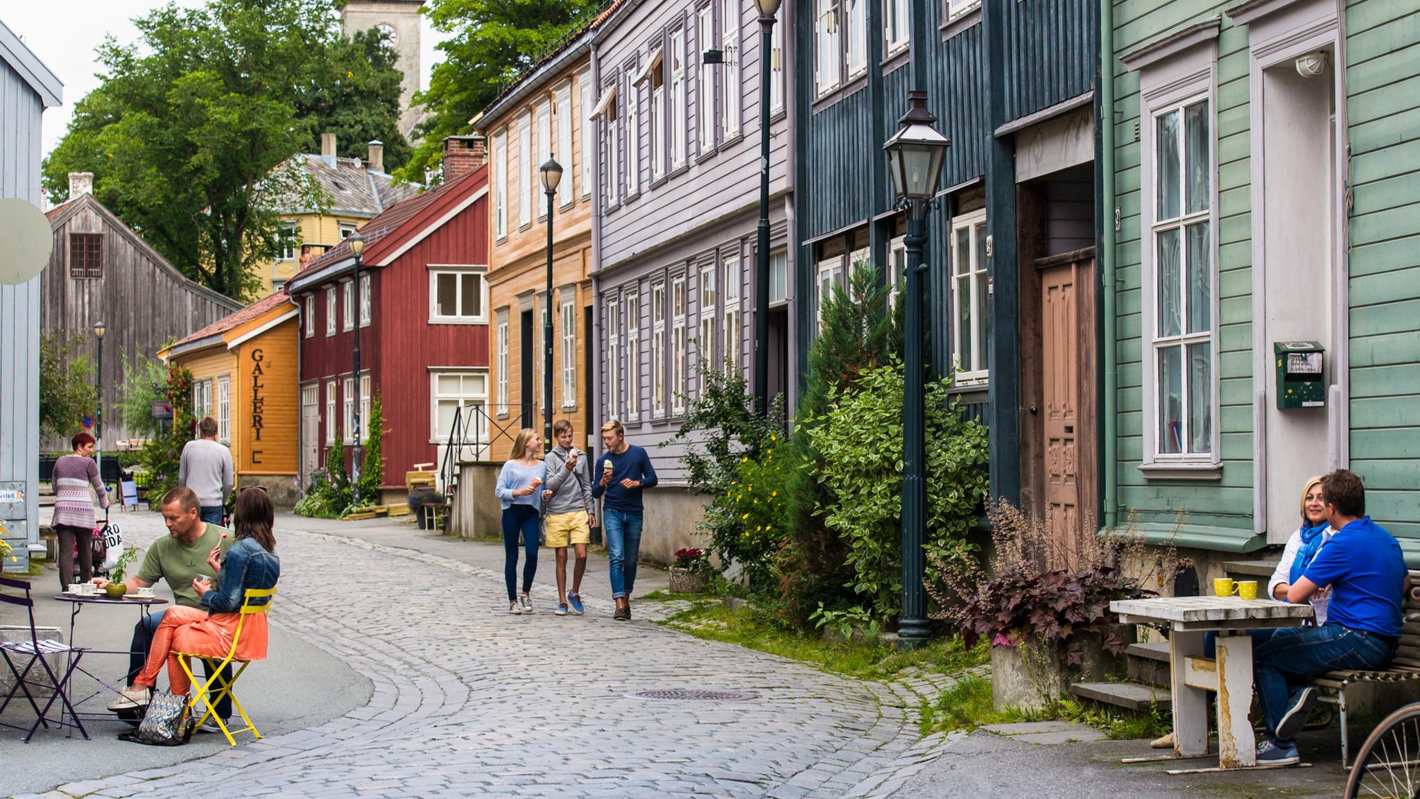 People walking along cobbled streets