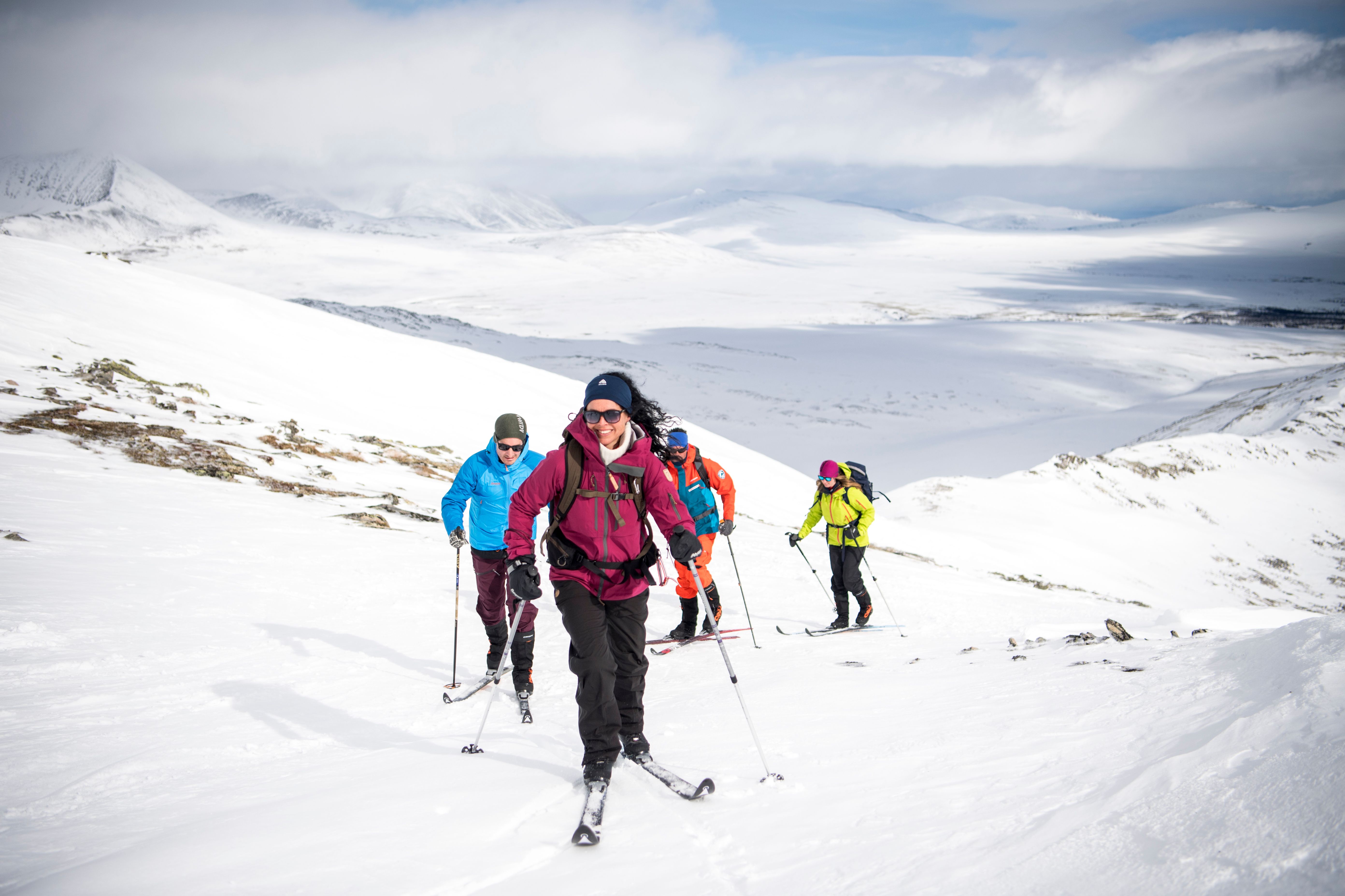 A group of people cross-country skiing in the Rondane mountains, Eastern Norway