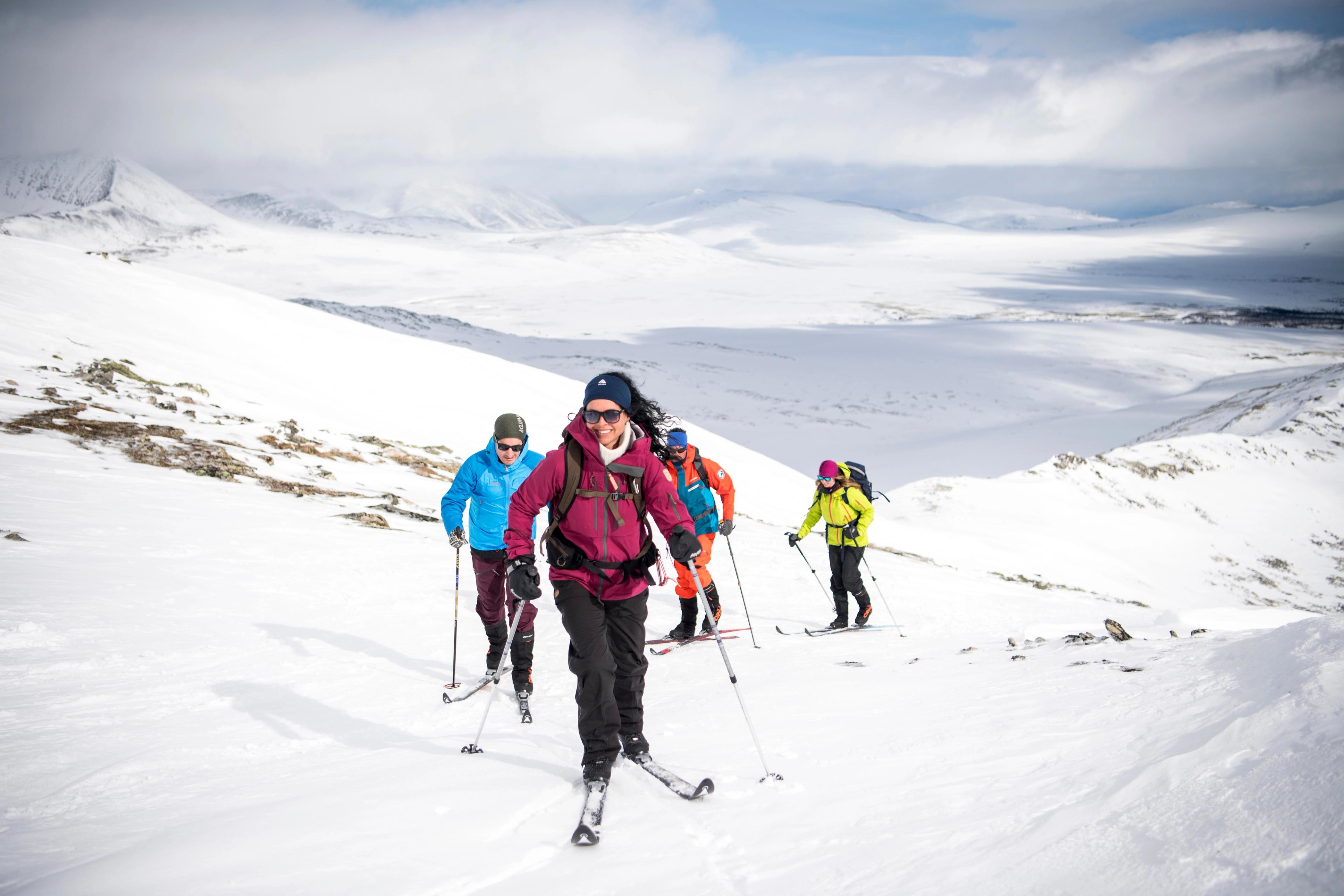 A group of people cross-country skiing in the Rondane mountains, Eastern Norway