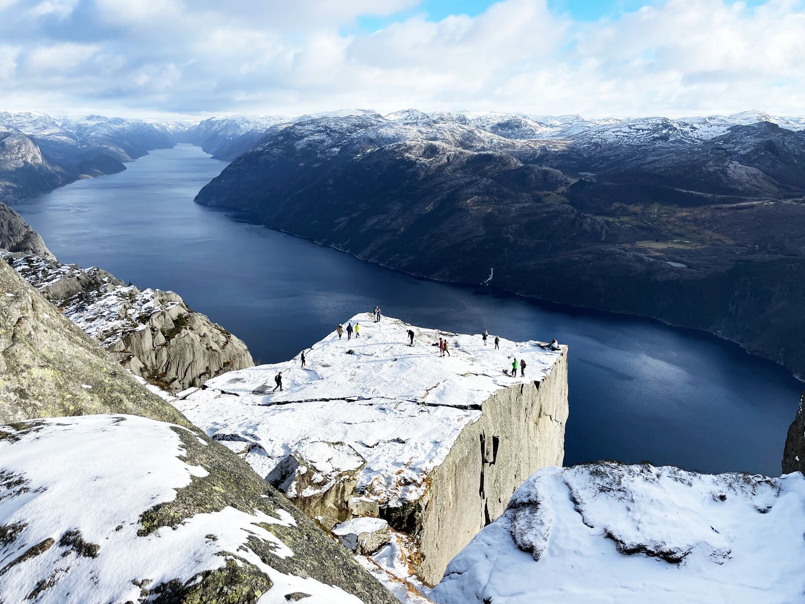 A snow-covered Preikestolen (Pulpit Rock) from above