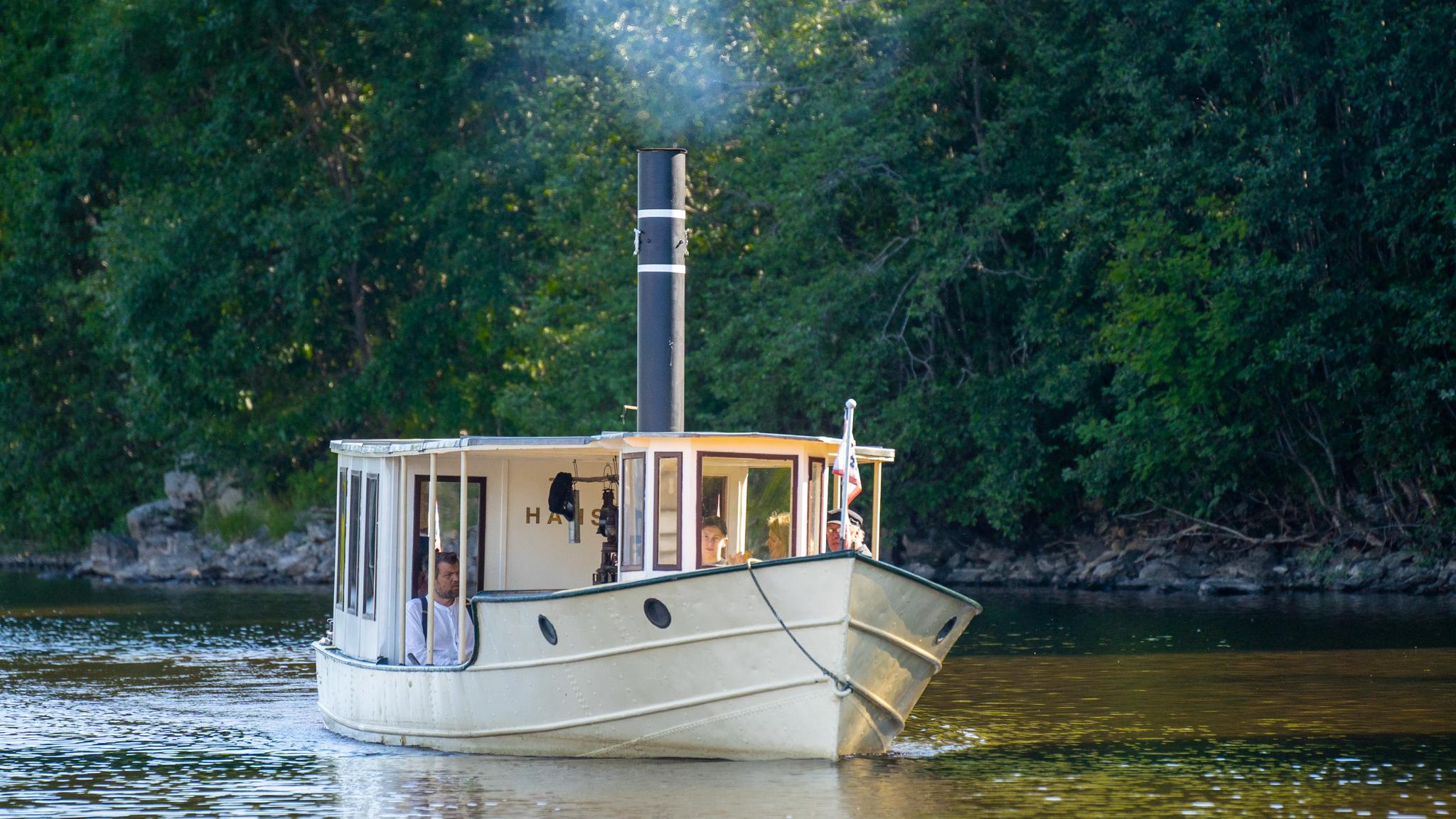 People on a mini-cruise with the D/S Hans on the Halden Canal in Eastern Norway.