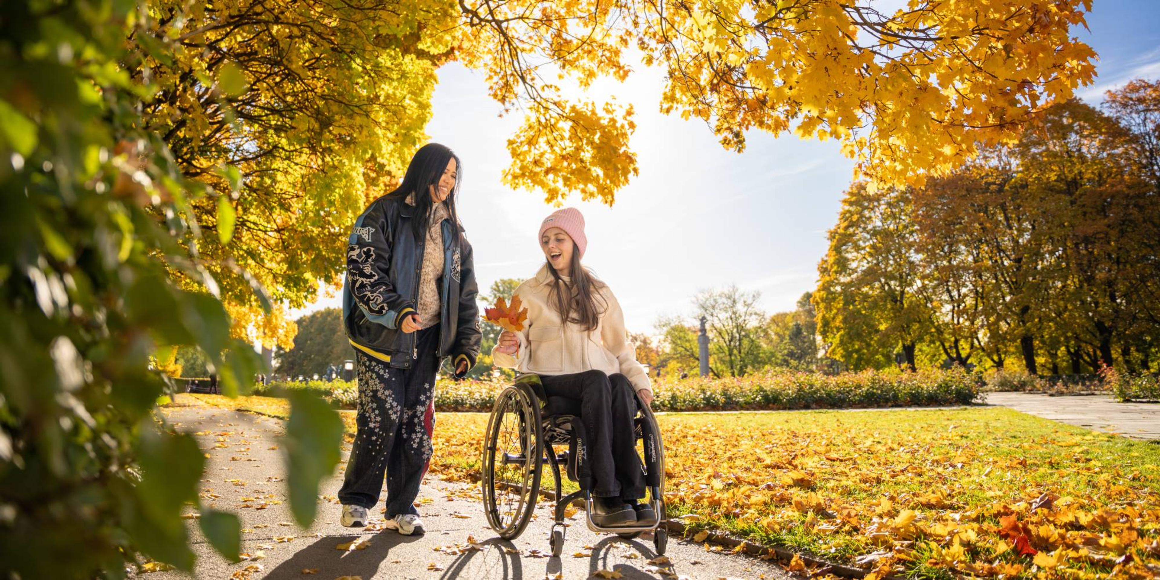 Two women in Vigelandsparken at Frogner in Oslo, Eastern Norway