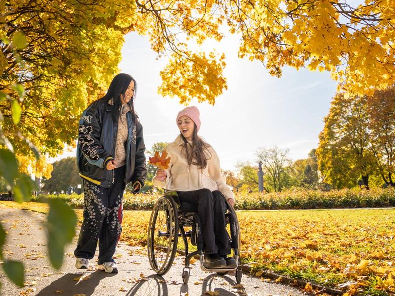 Two women in Vigelandsparken at Frogner in Oslo, Eastern Norway