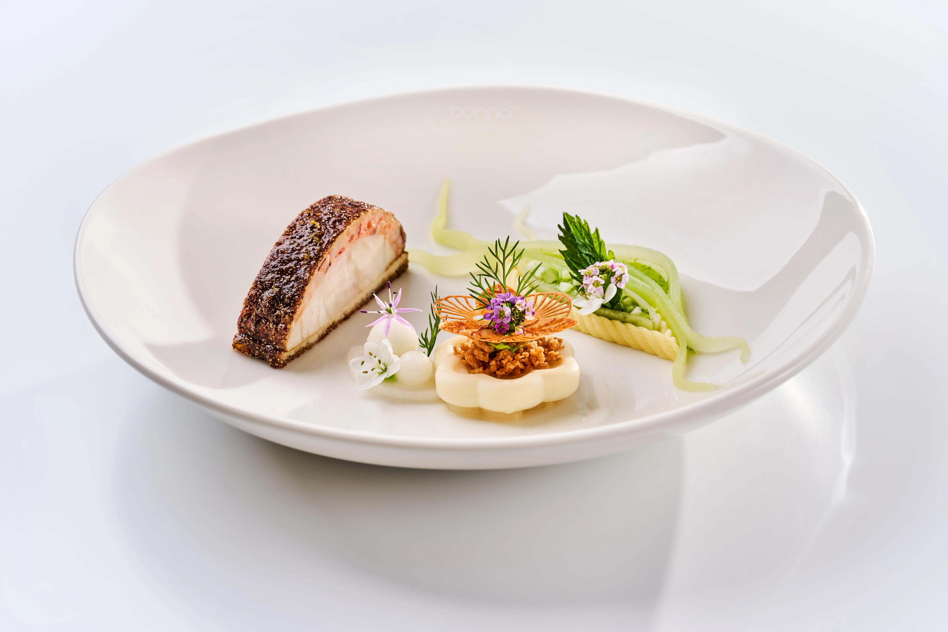 An eagle fish and lobster dish that won the award for the best "Theme on a Plate" at Bocuse d'Or 2025.