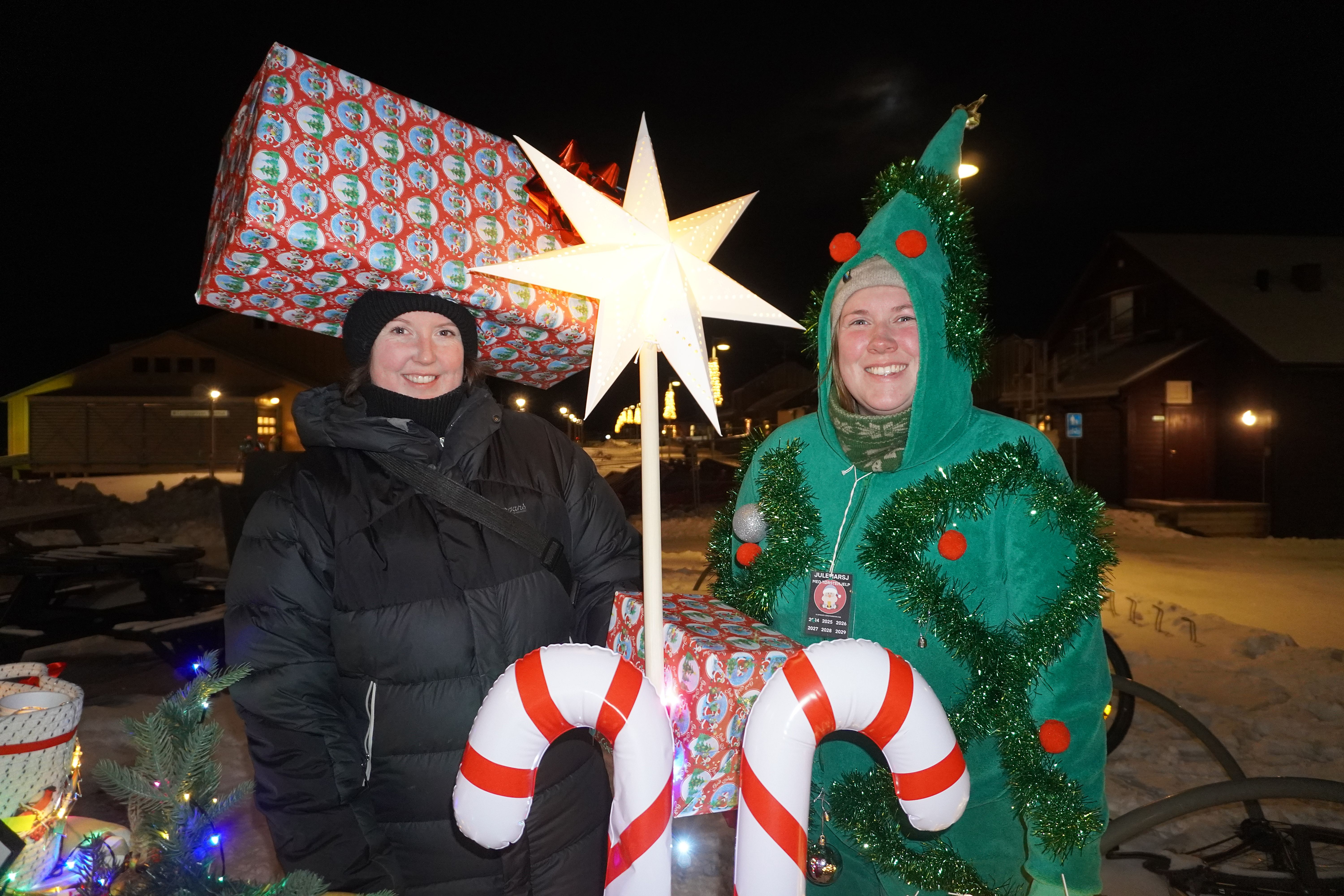 Two women dressed up in Christmas clothes