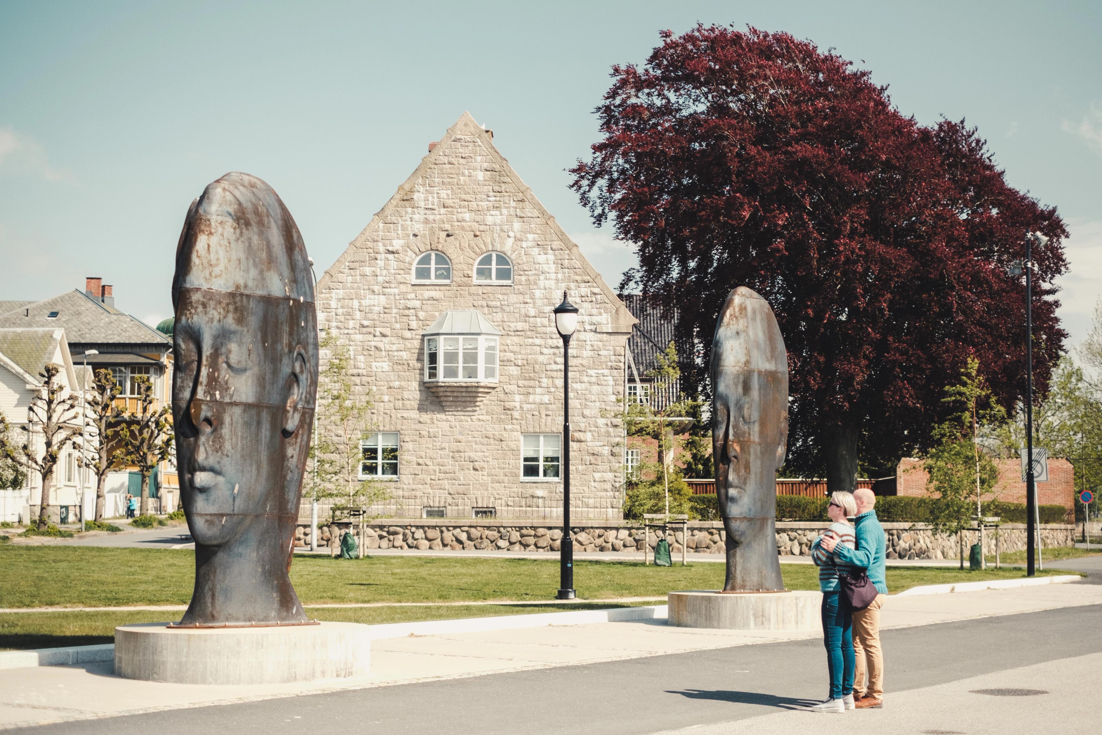 A couple looking at sculptures in Fredrikstad, Eastern Norway