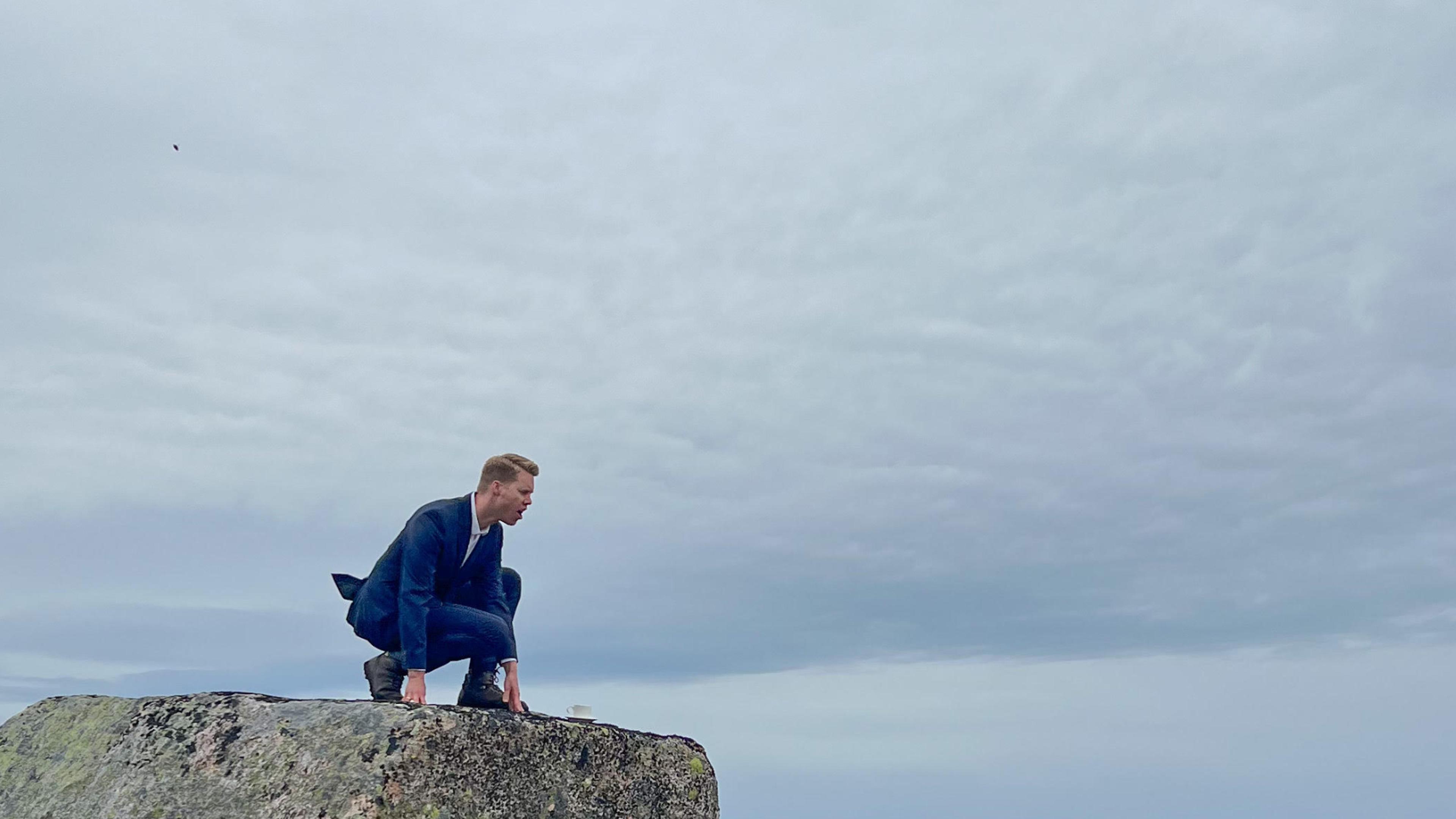 Kjetil Krogstad sitting on a stone
