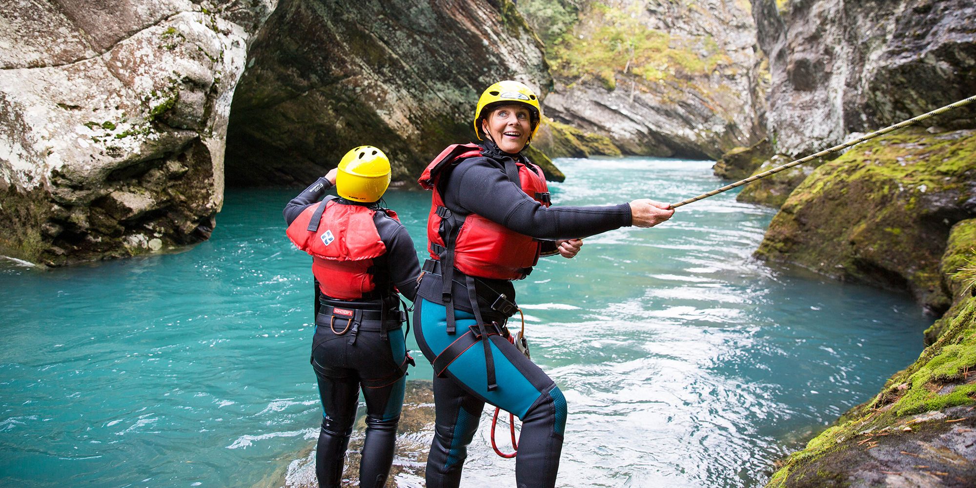 People canyoning in Valldal in Møre og Romsdal in Fjord Norway