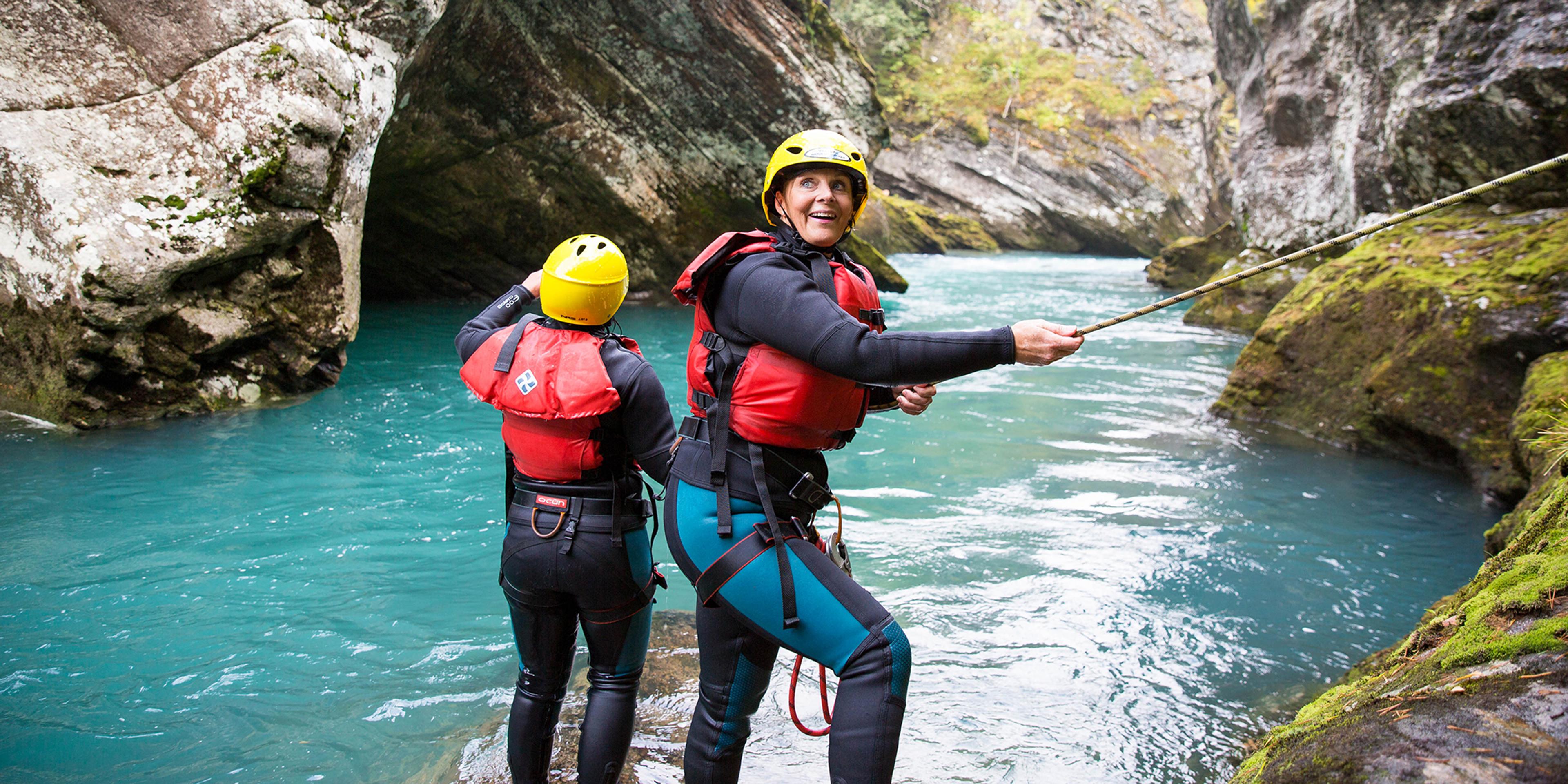 People canyoning in Valldal in Møre og Romsdal in Fjord Norway