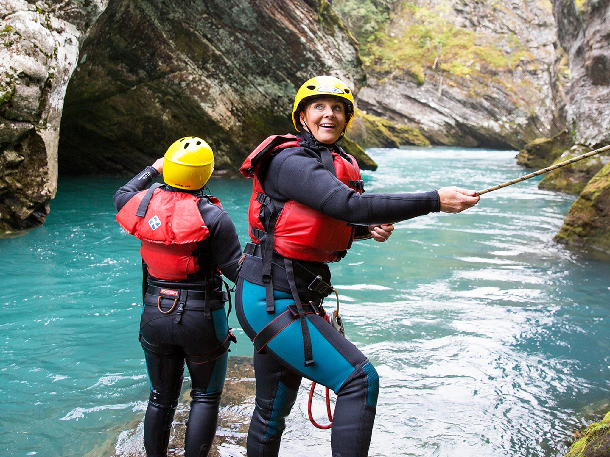 People canyoning in Valldal in Møre og Romsdal in Fjord Norway