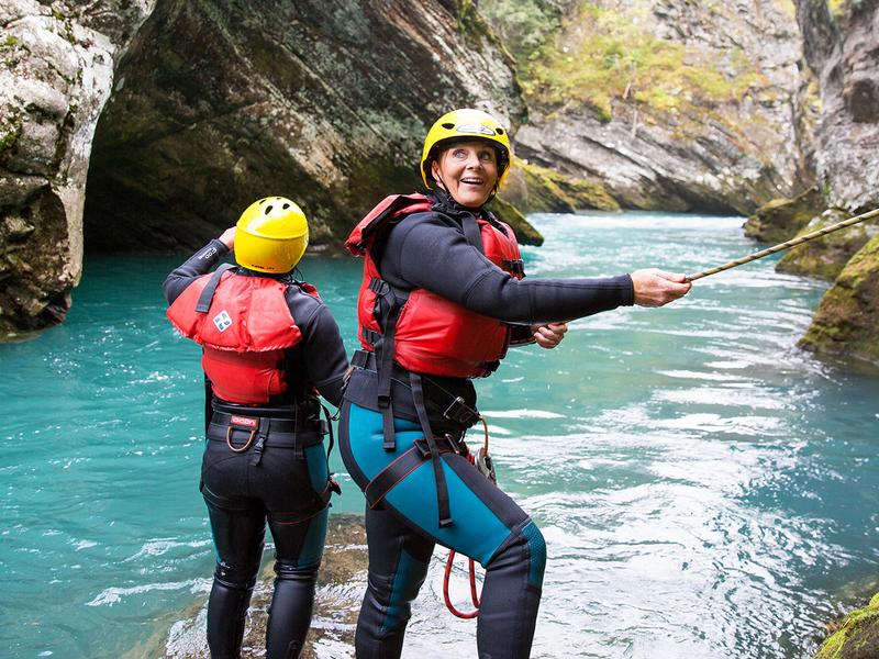 People canyoning in Valldal in Møre og Romsdal in Fjord Norway