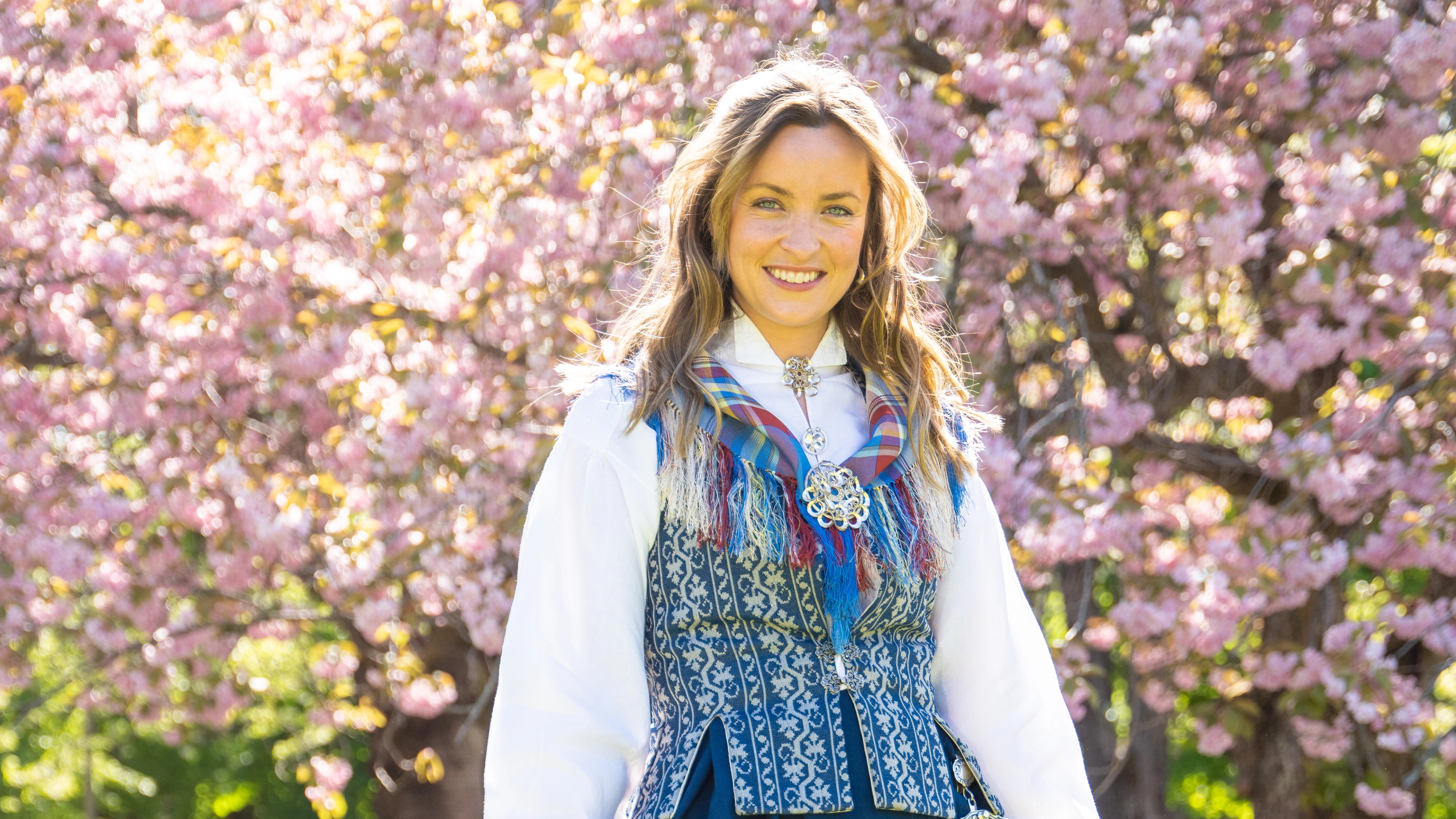 A woman in a bunad traditional costume