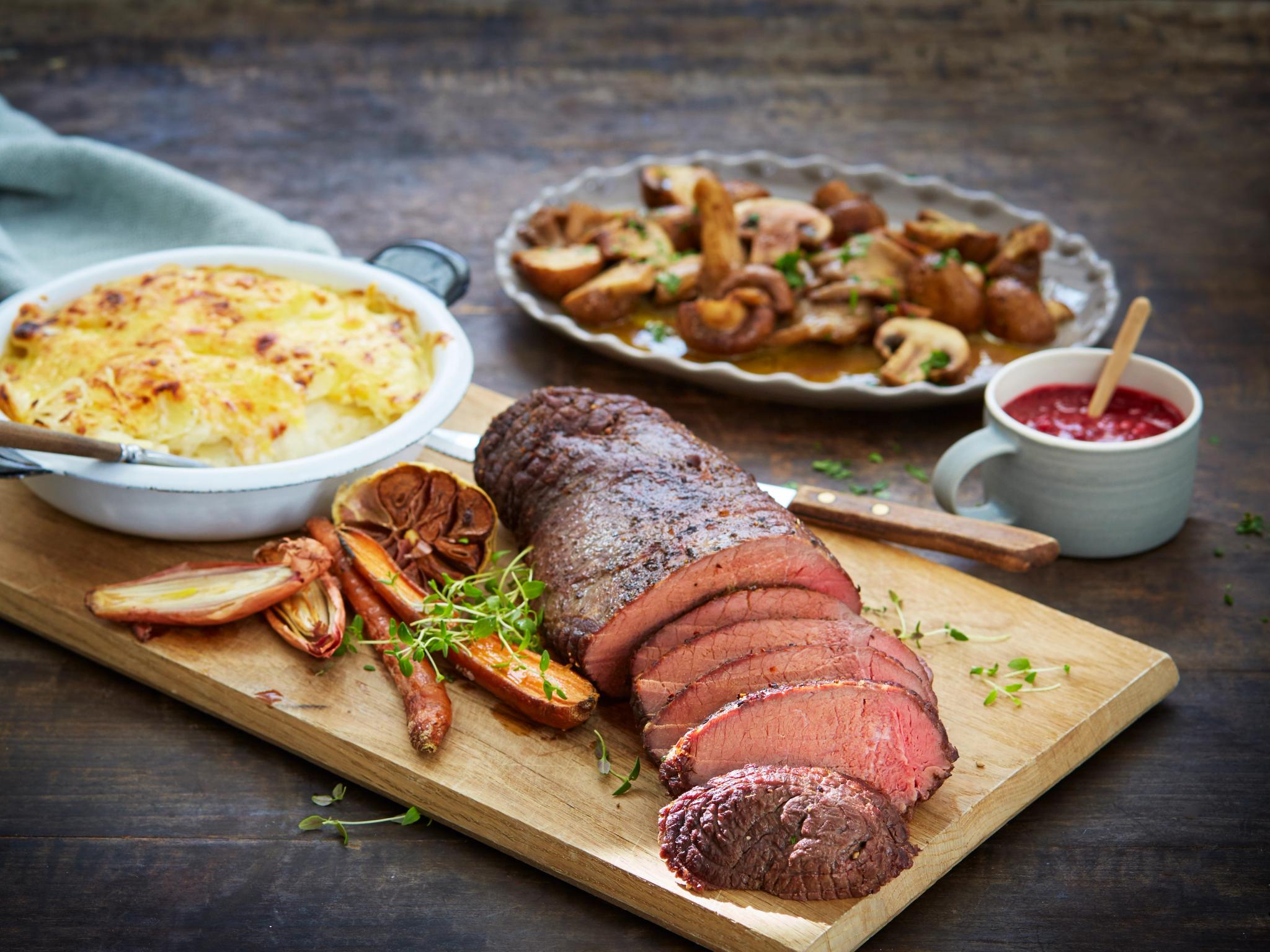 Traditional Norwegian venison steak, with potatoes, mushrooms, lingonberry jam