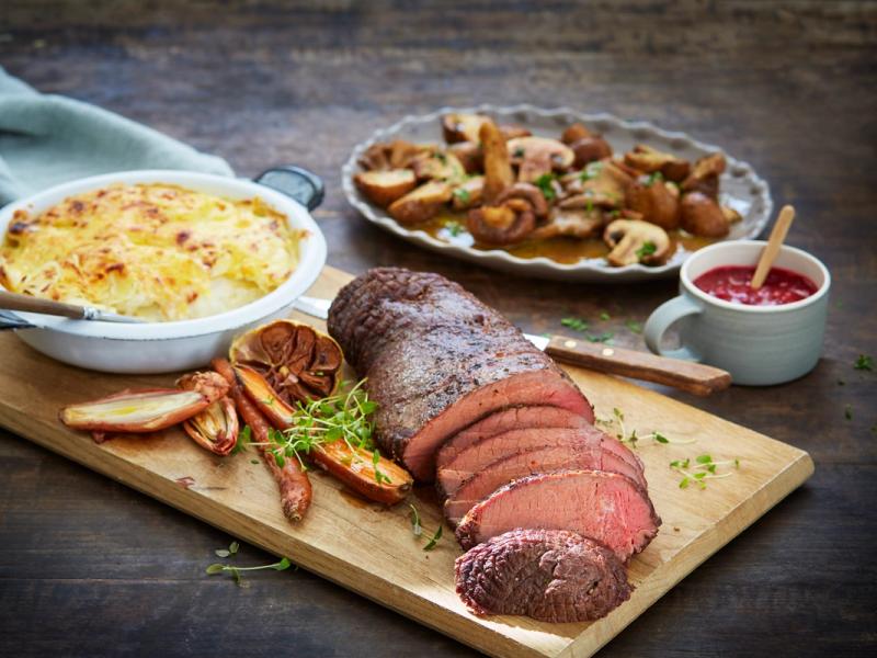 Traditional Norwegian venison steak, with potatoes, mushrooms, lingonberry jam