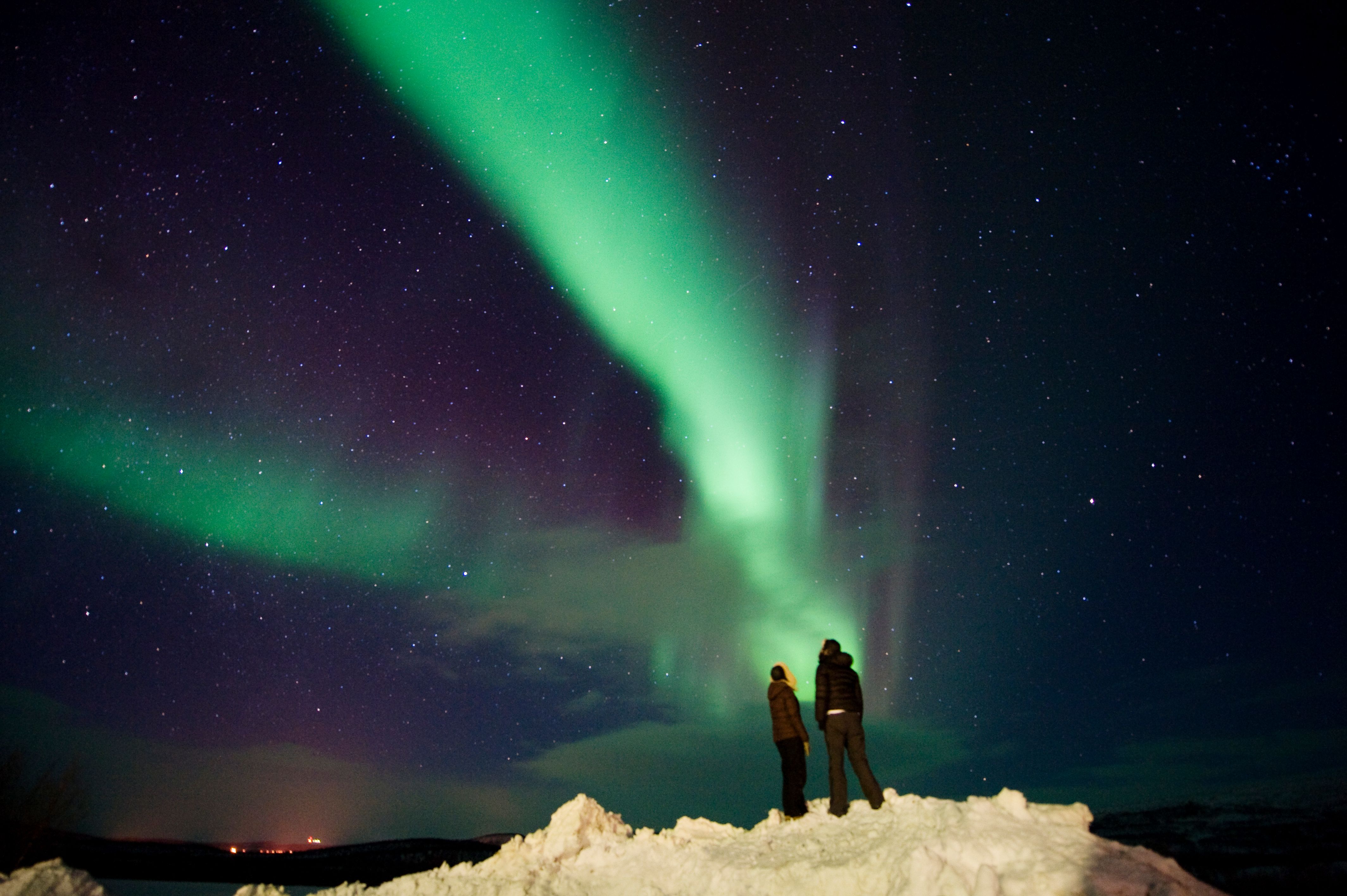People looking at the northern lights in Finnmark