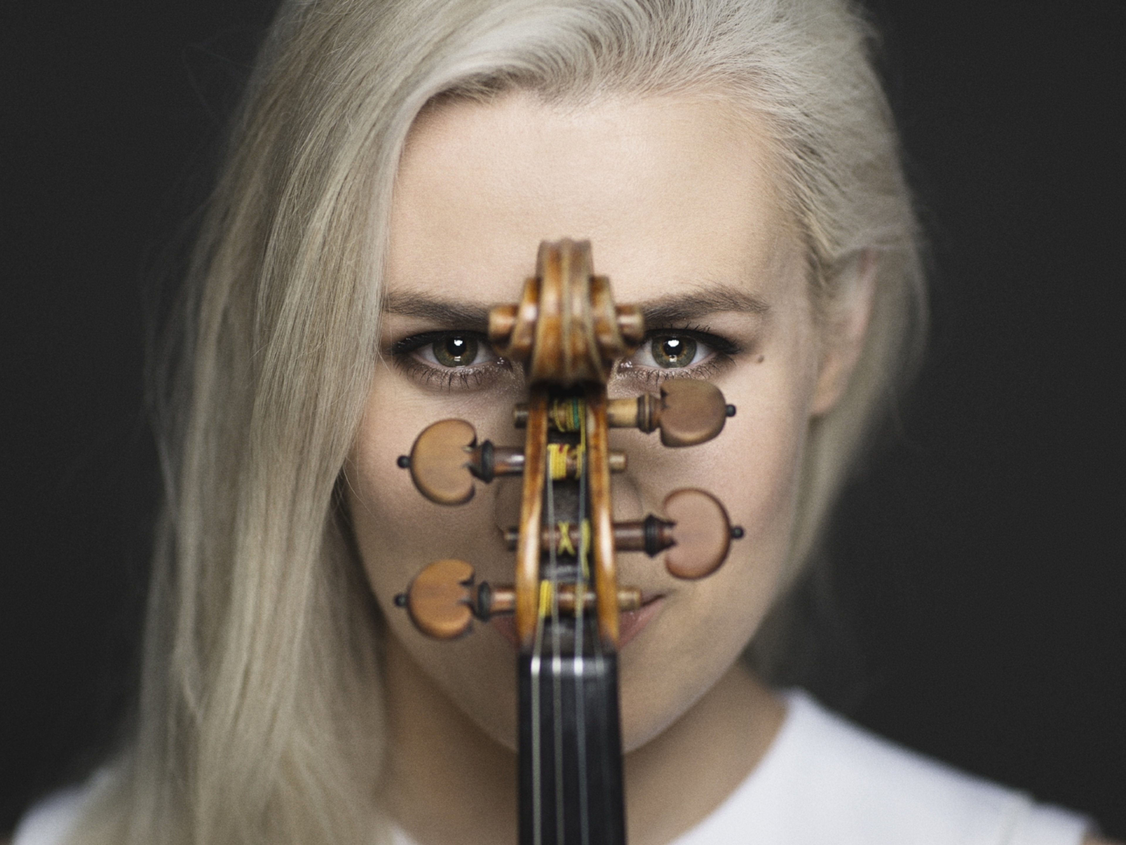 Portrait of the Norwegian violinist Eldbjørg Hemsing with her violin