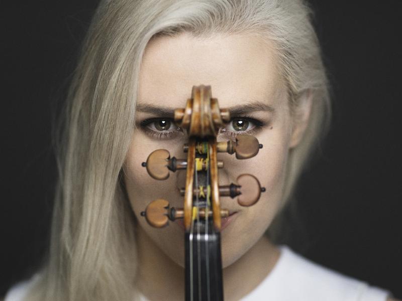 Portrait of the Norwegian violinist Eldbjørg Hemsing with her violin