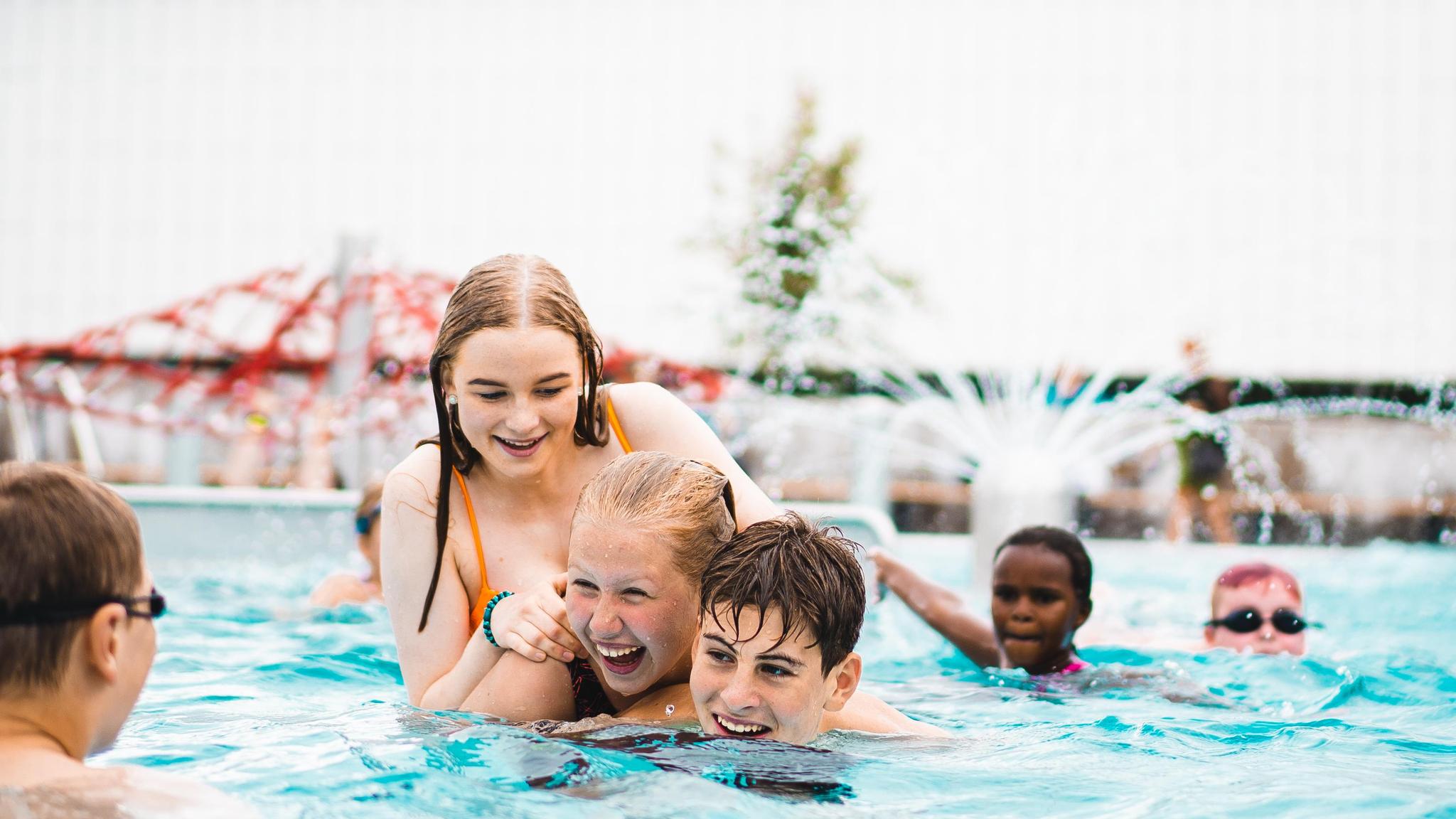 Kids playing in a pool