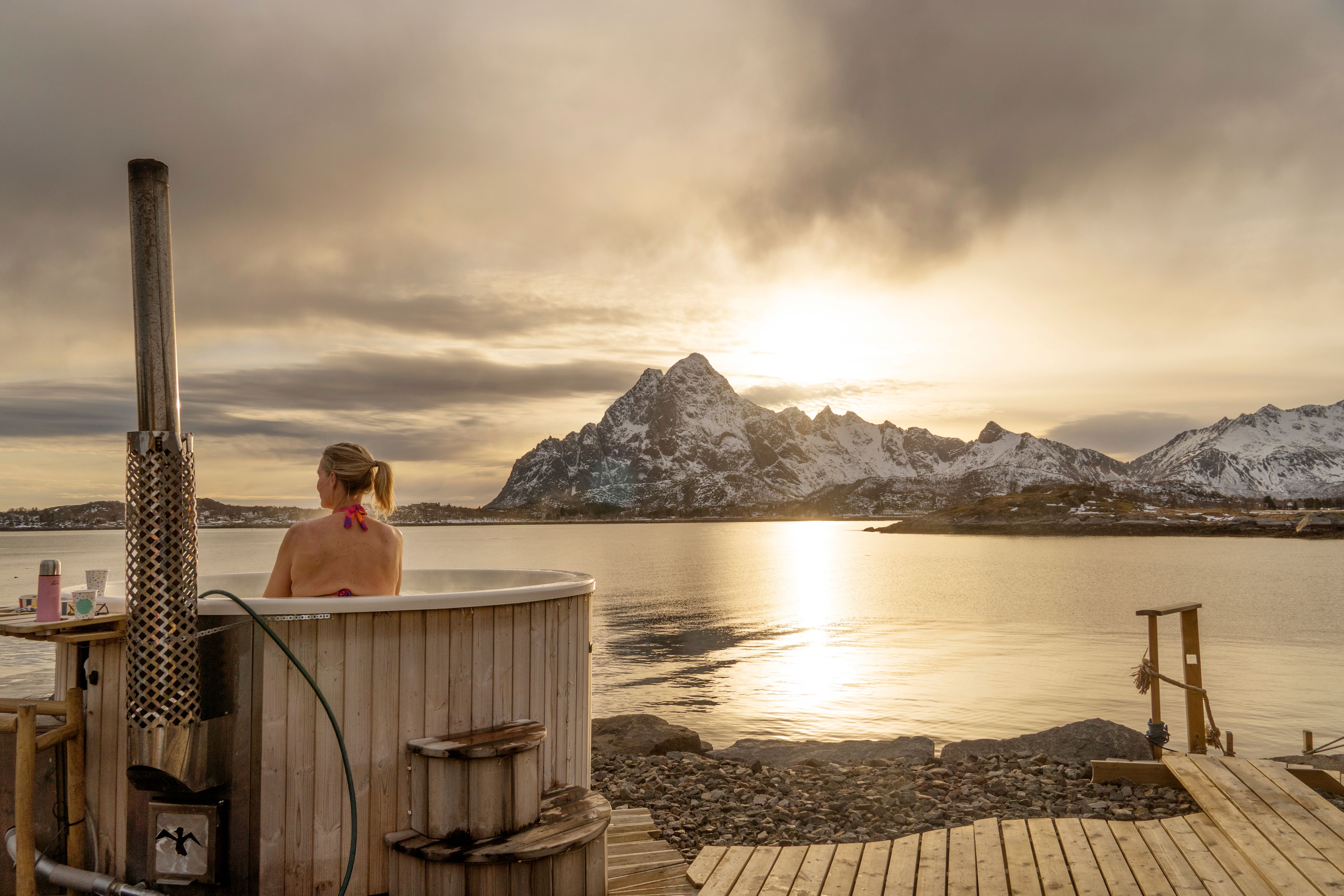 Woman in jacuzzi in Lofoten