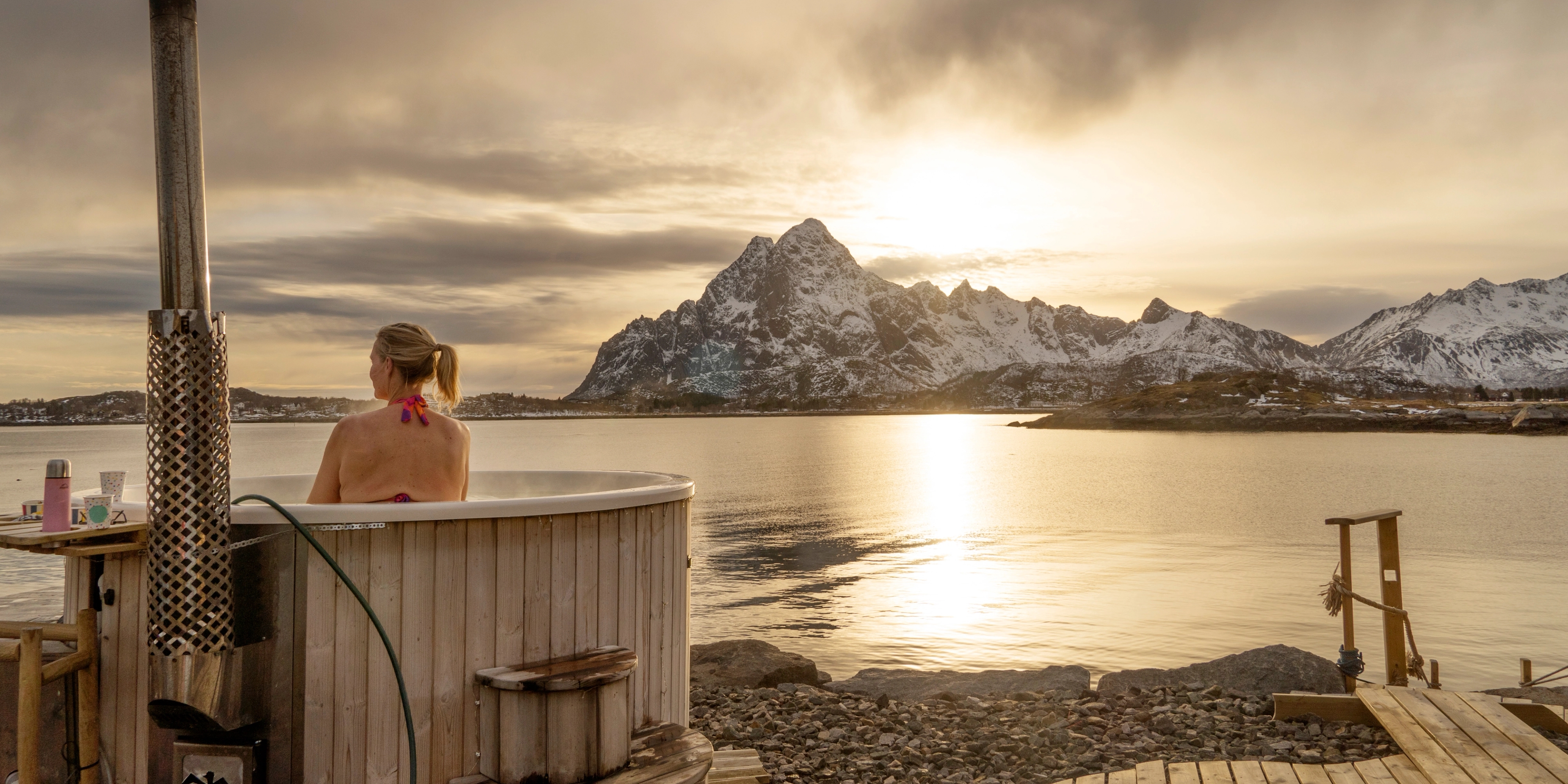 Woman in jacuzzi in Lofoten