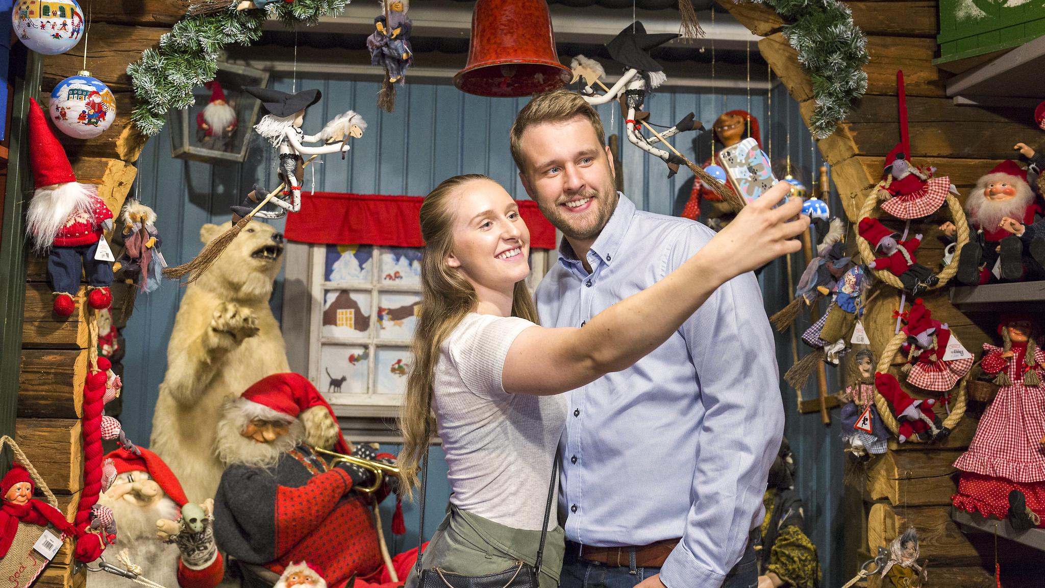 A couple at the Christmas house in Drøbak, Eastern Norway