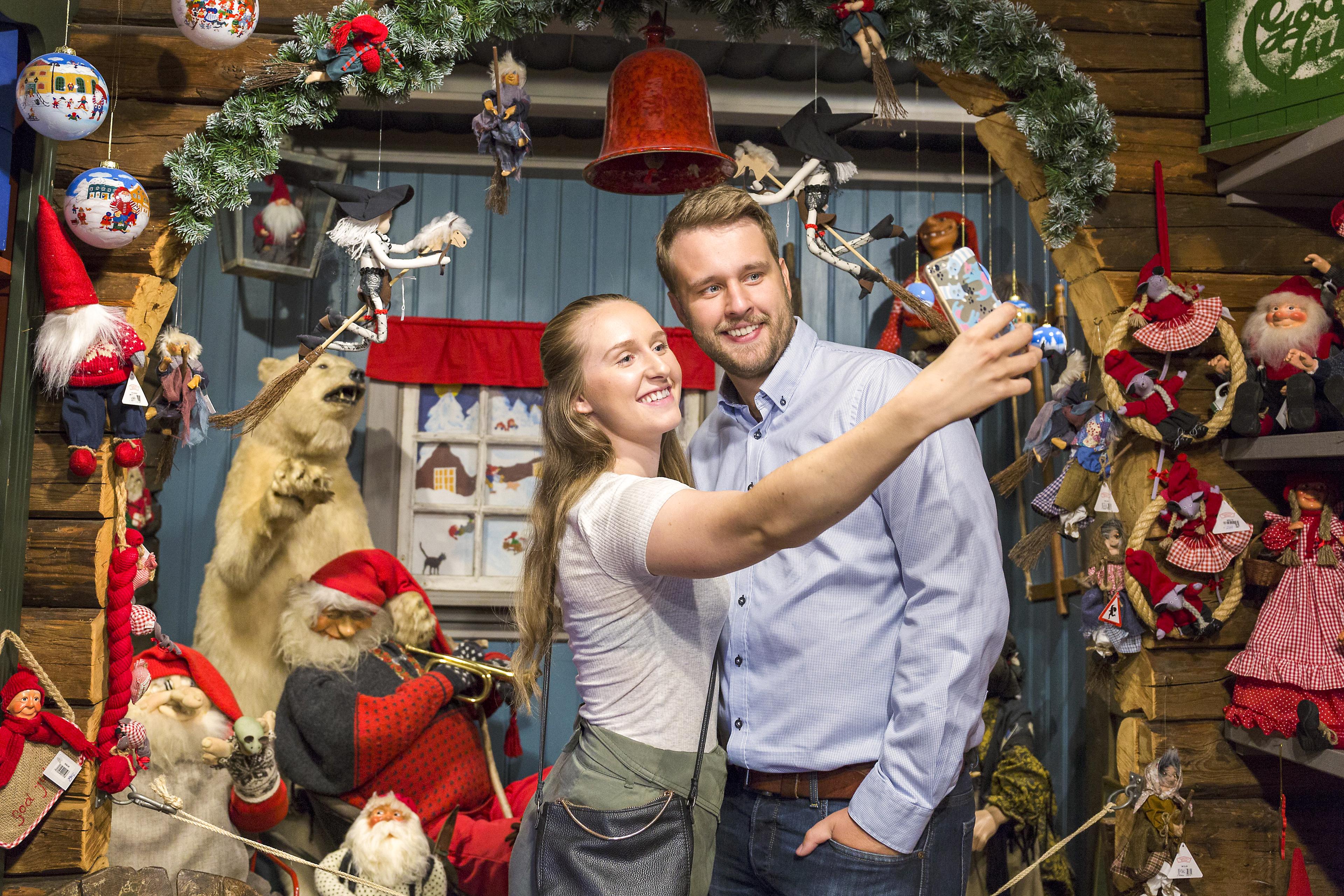 A couple at the Christmas house in Drøbak, Eastern Norway