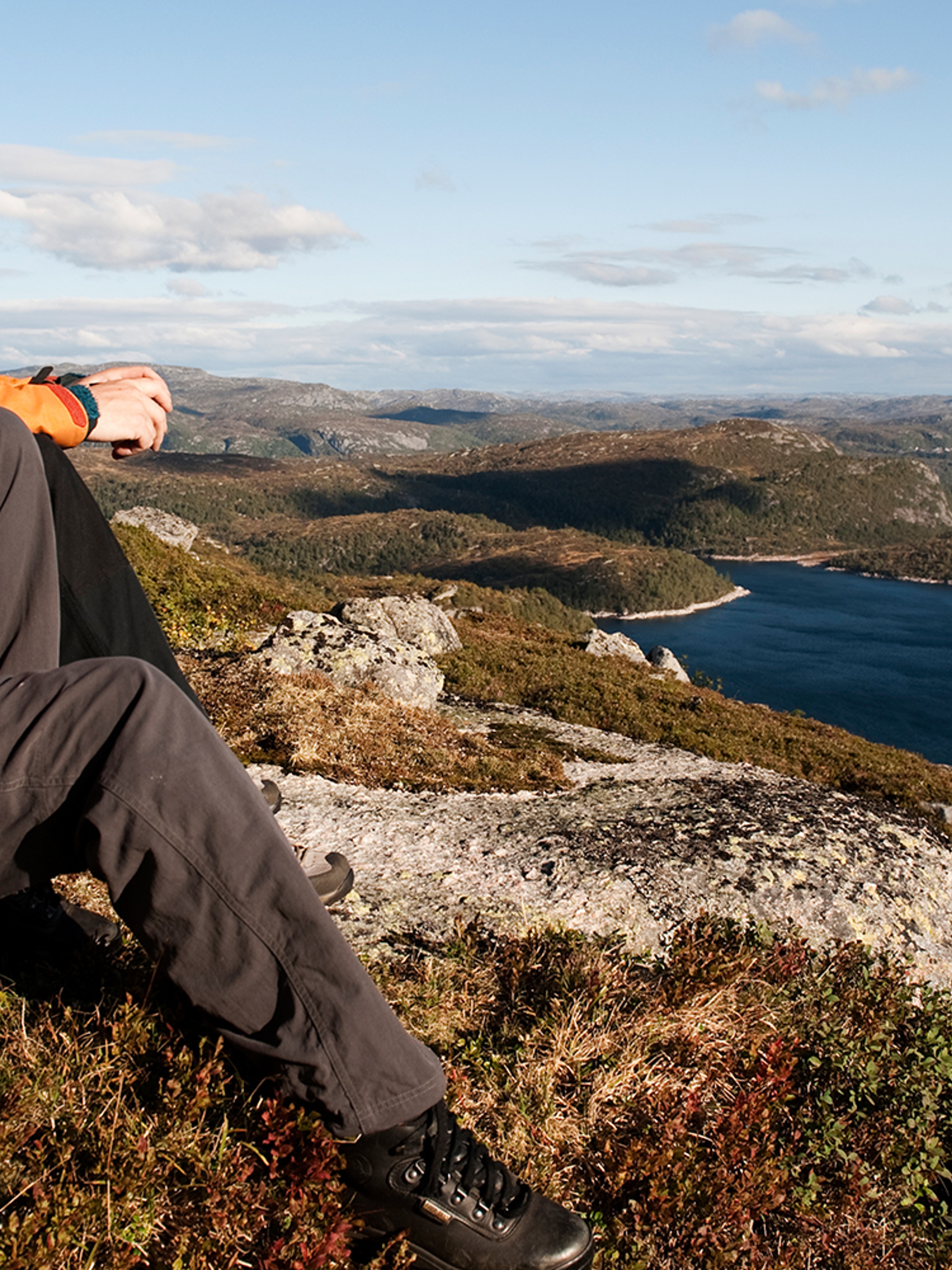 Two people enjoying the view of Sirdal's mountain landscape