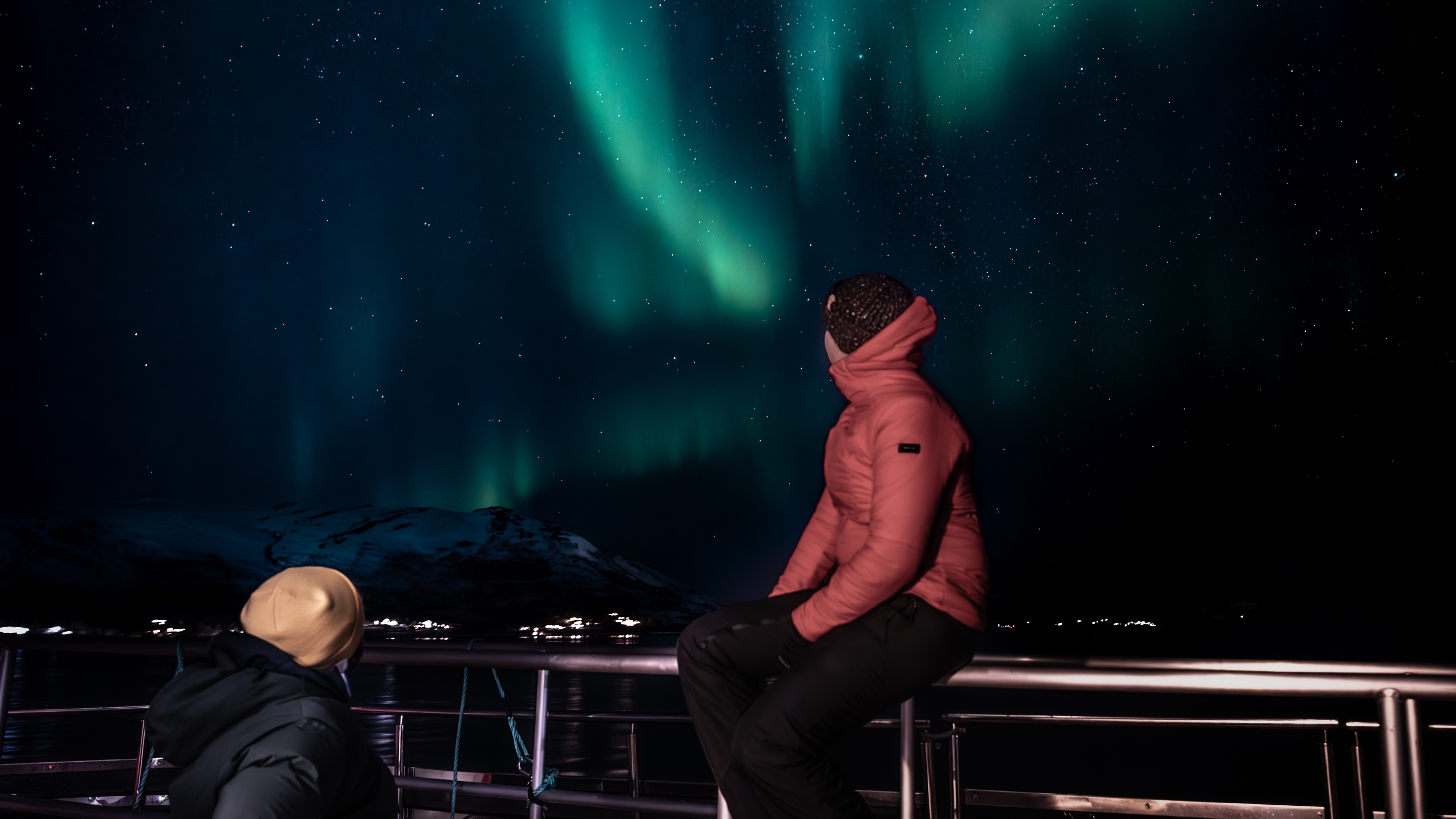 Myriam and Pierre Cabon under the northern lights in Tromsø, Nortern Norway