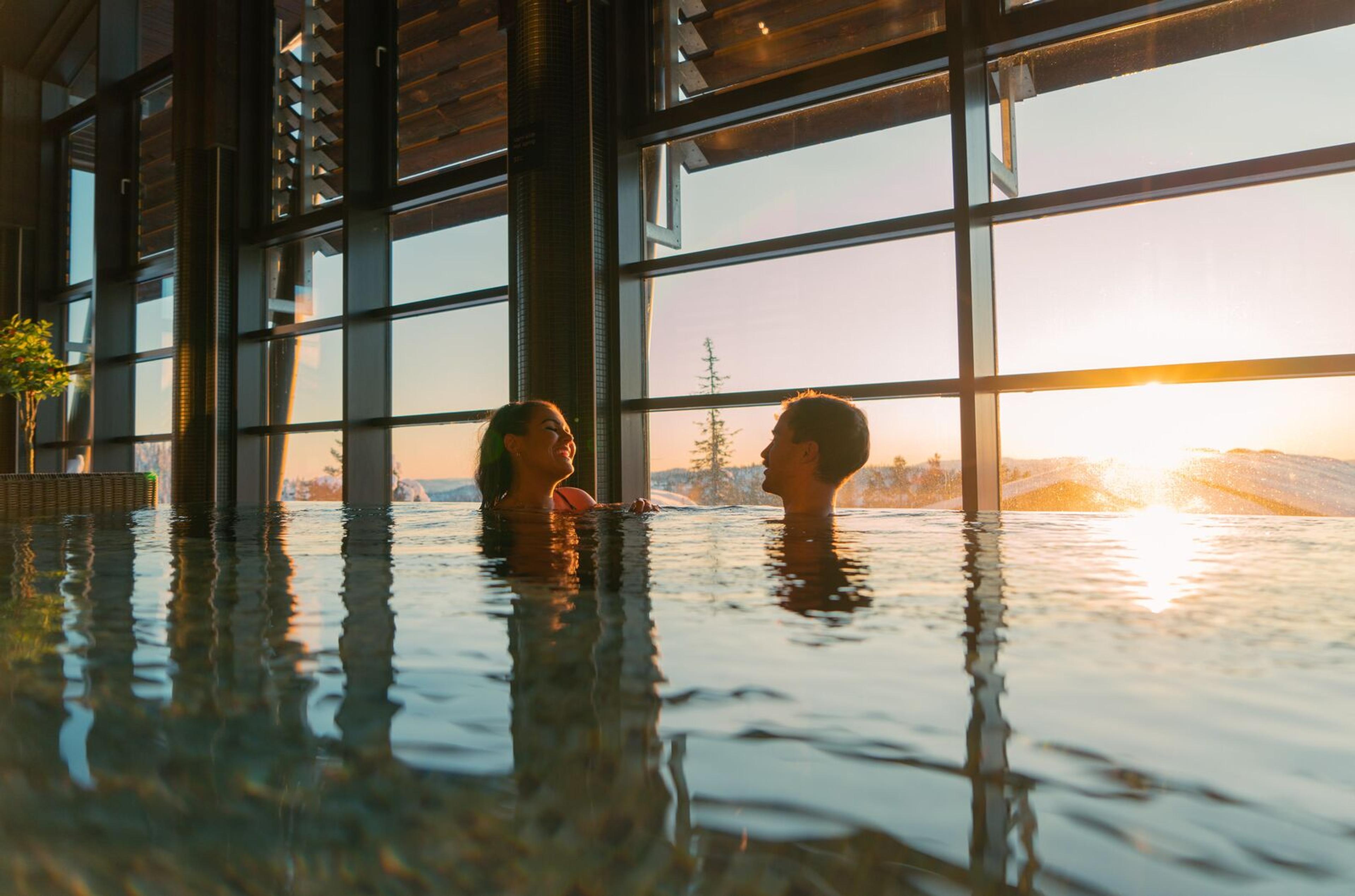 A couple in the pool at Norefjell Ski & Spa, Eastern Norway.