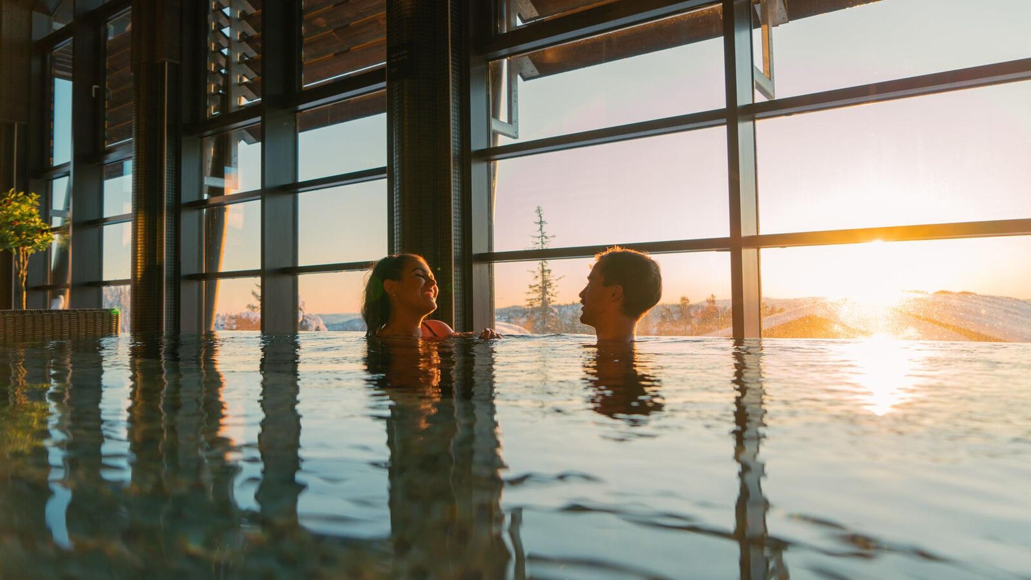 A couple in the pool at Norefjell Ski & Spa, Eastern Norway.