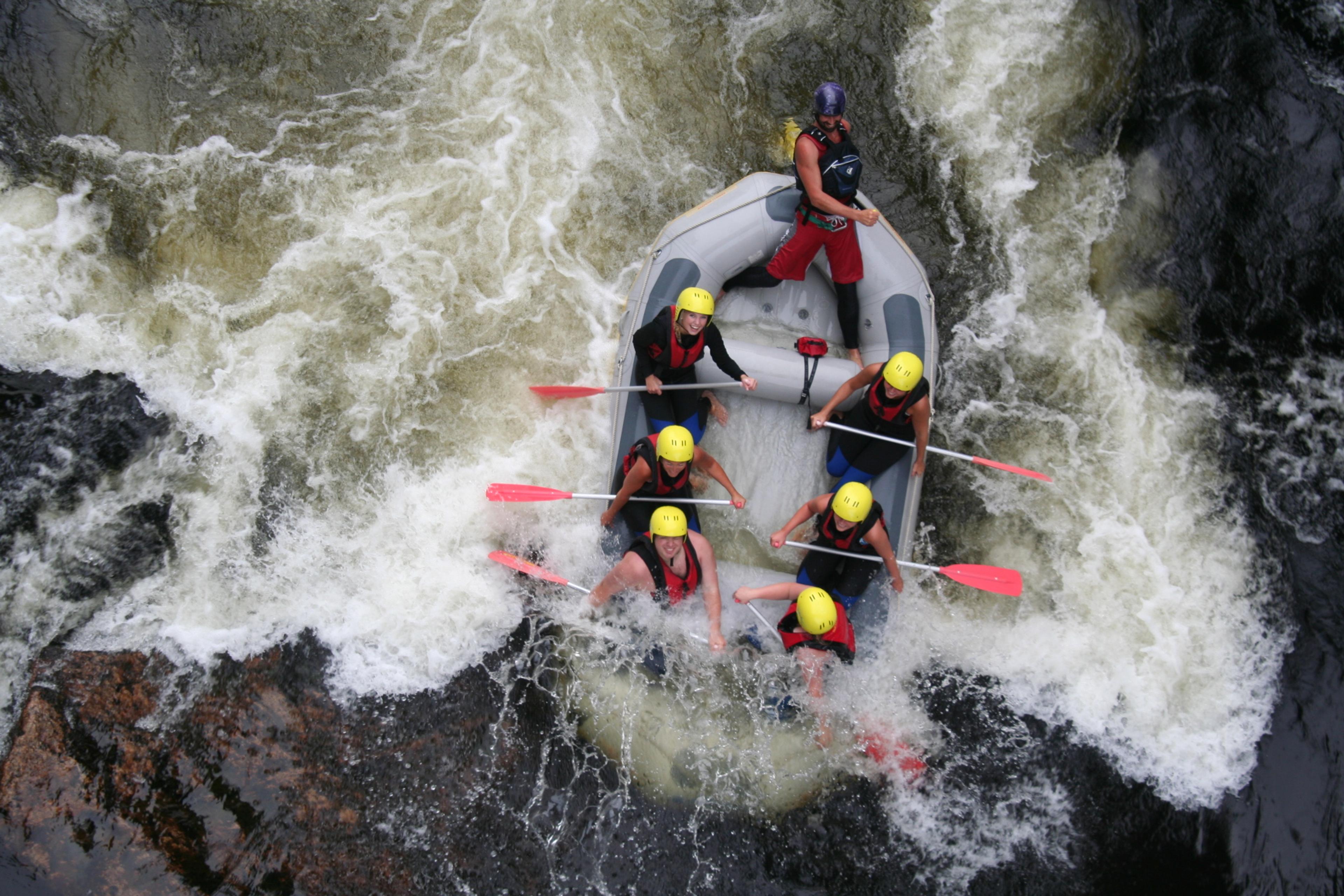A group of people rafting in the Mandalselva river in Mandal, Southern Norway