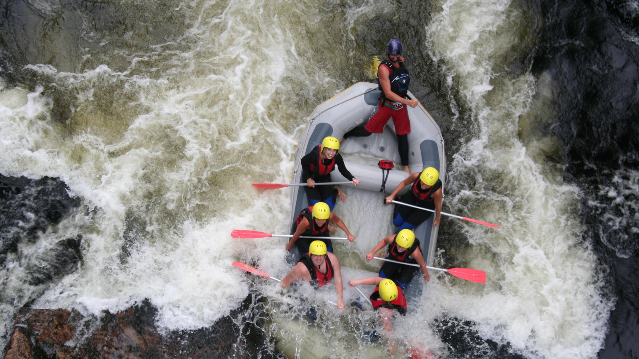 A group of people rafting in the Mandalselva river in Mandal, Southern Norway