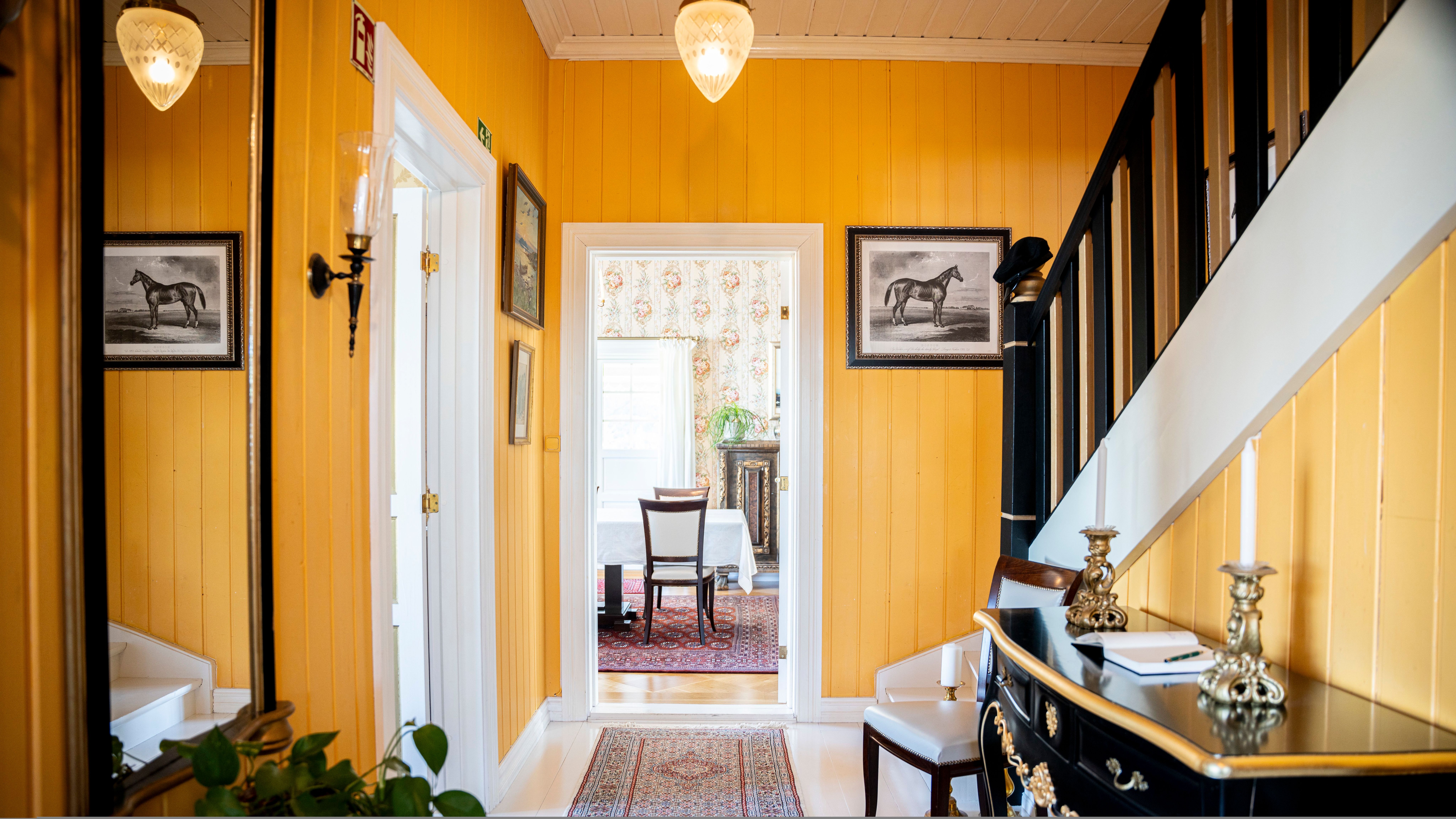 Yellow entrance and brown stairs