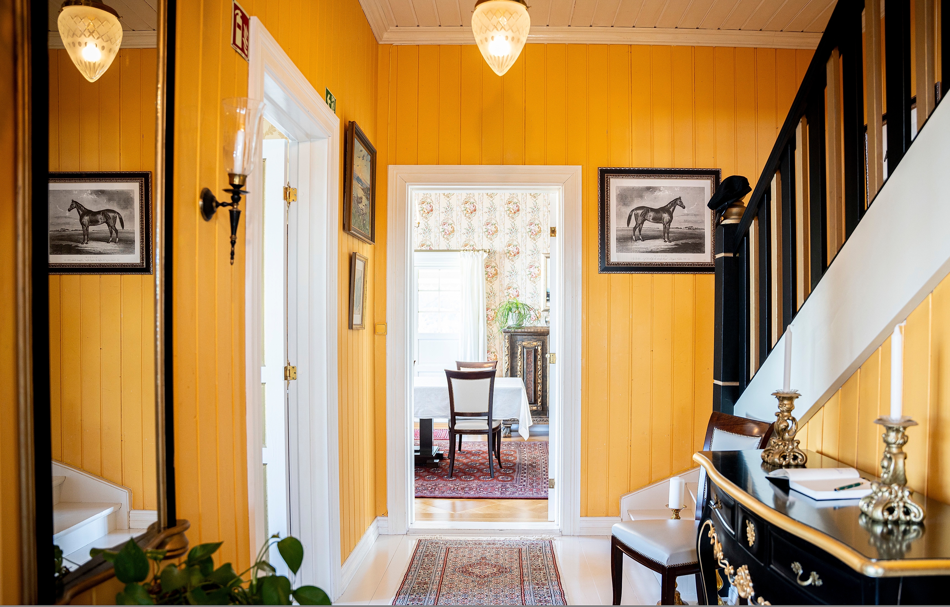 Yellow entrance and brown stairs