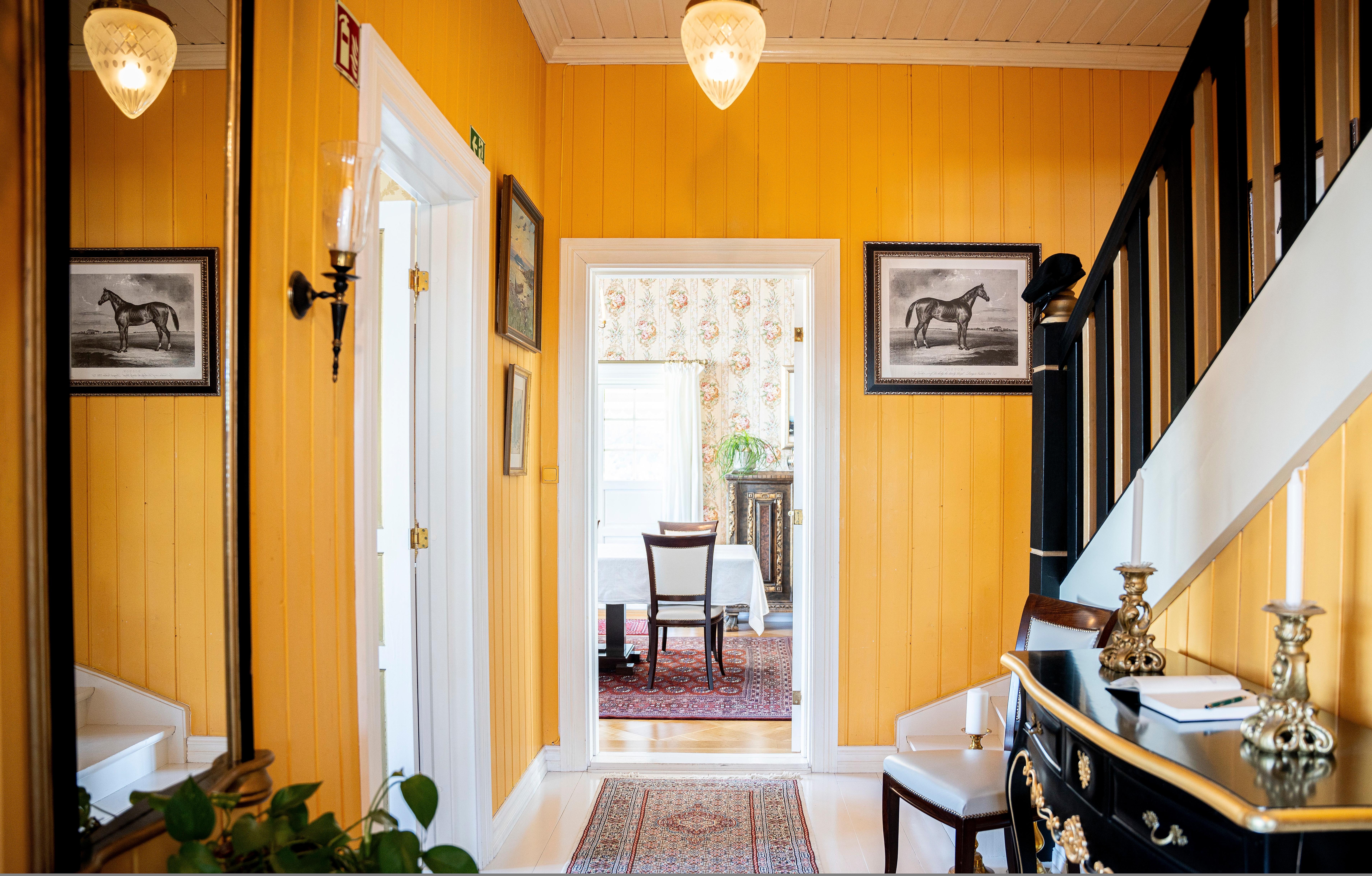 Yellow entrance and brown stairs
