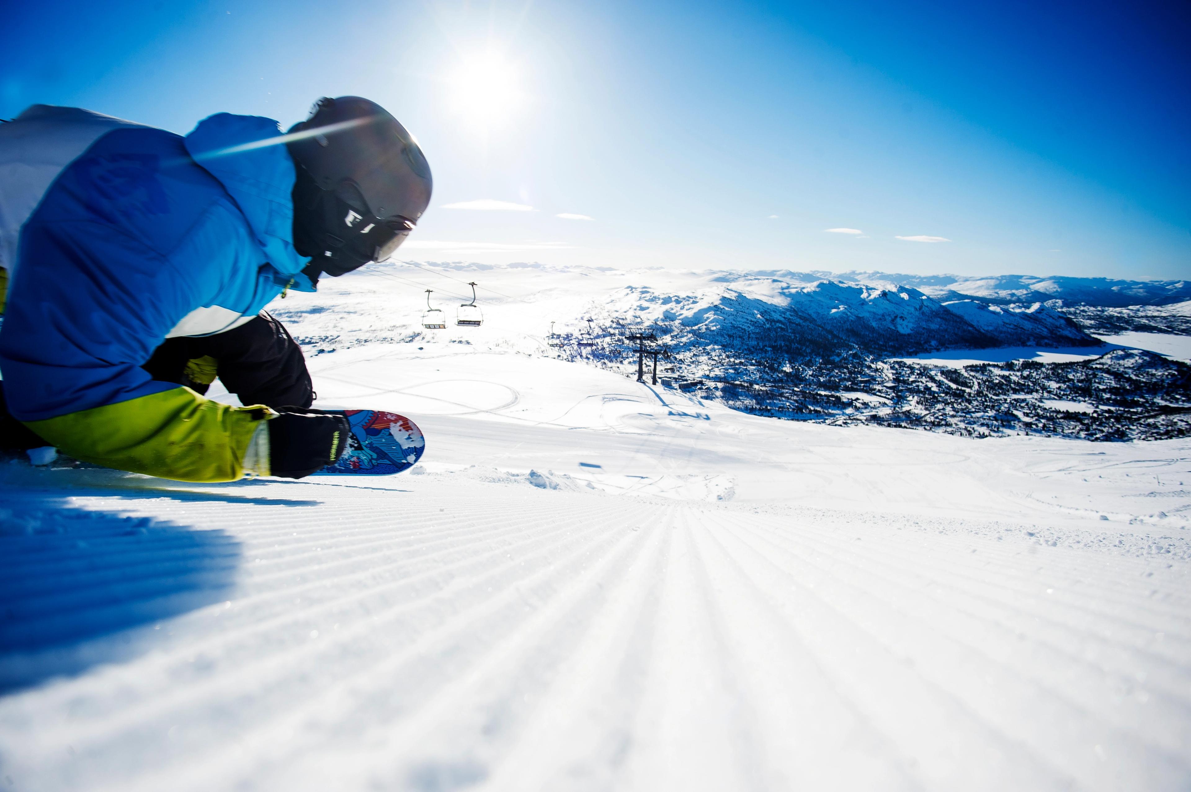 Snowboarder in full speed at Hovden Alpine Centre in Setesdal, Southern Norway