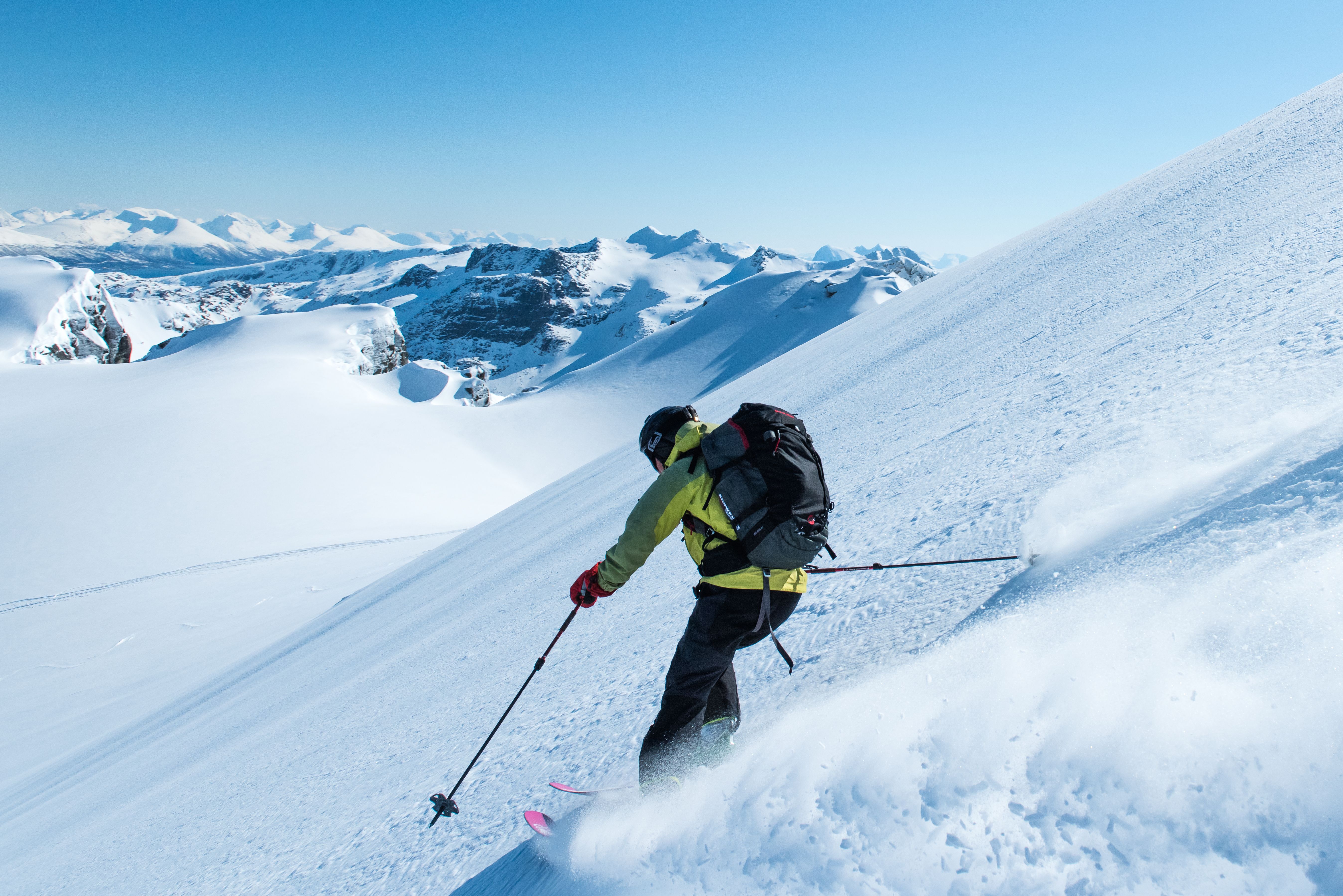 A man is ski touring in Northern Norway