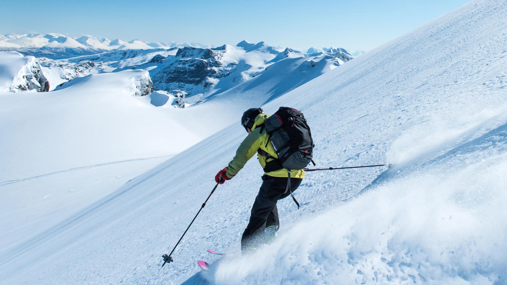 A man is ski touring in Northern Norway