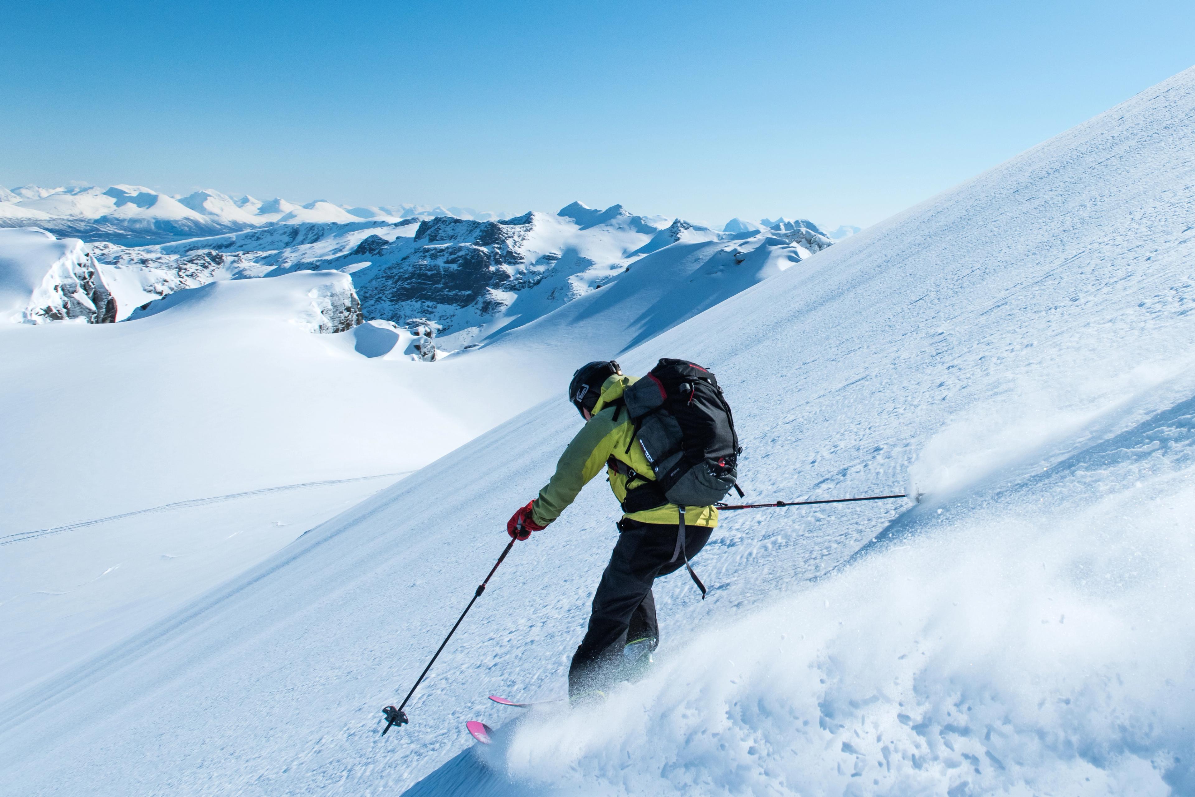 A man is ski touring in Northern Norway