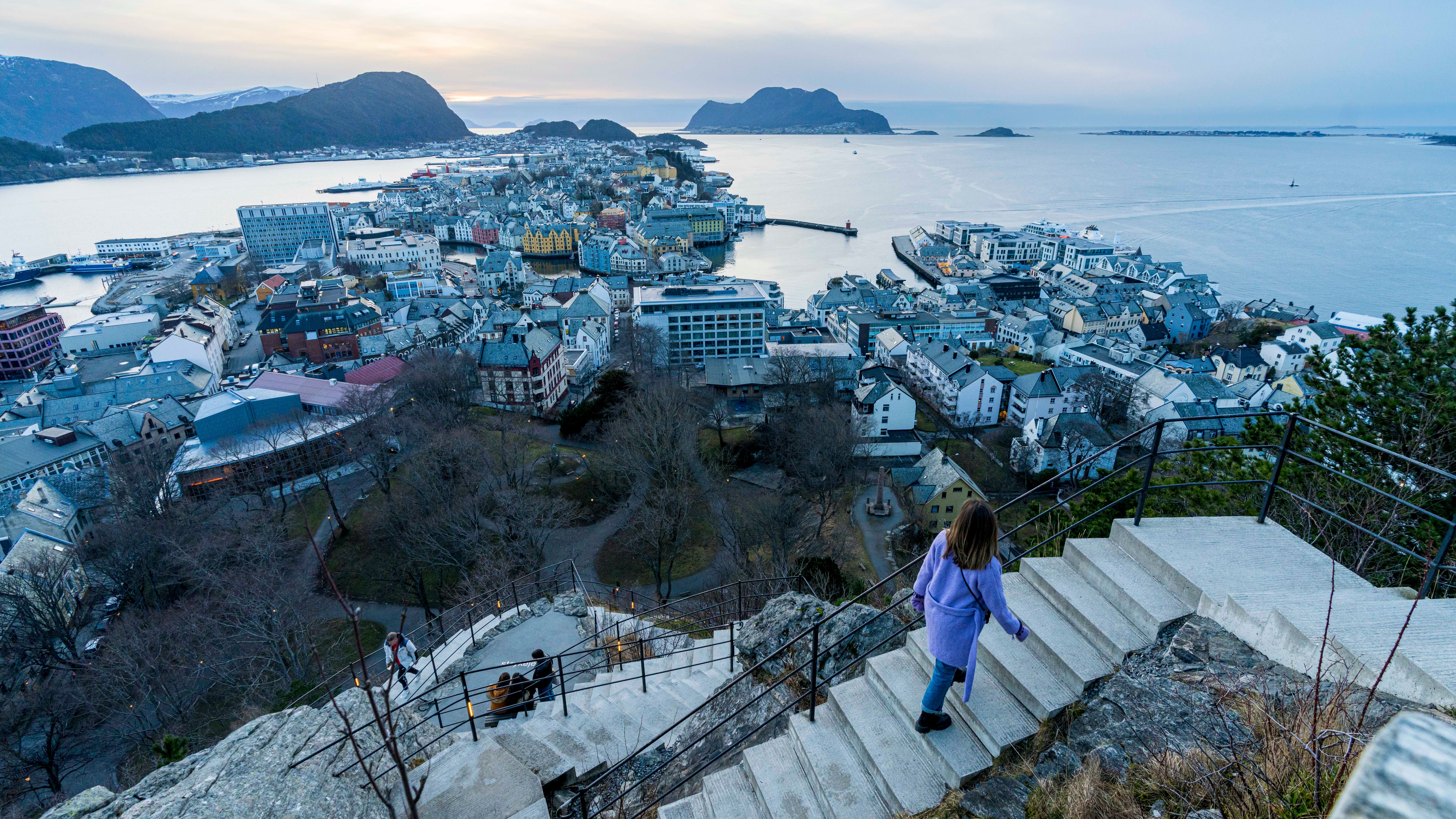 Woman walking the stairs to the Aksla view point in Ålesund