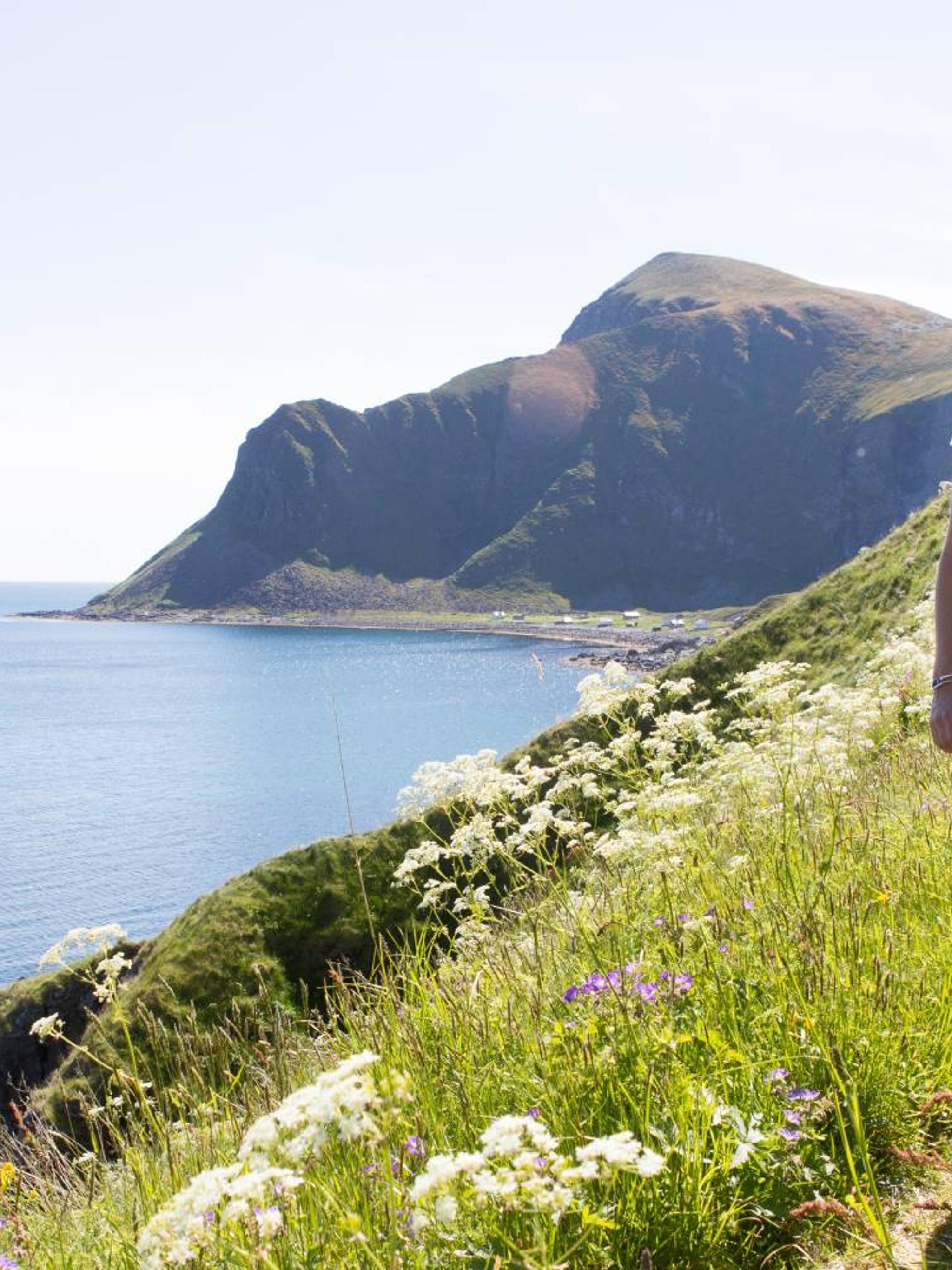 Woman hiking in Lofoten, Northern Norway