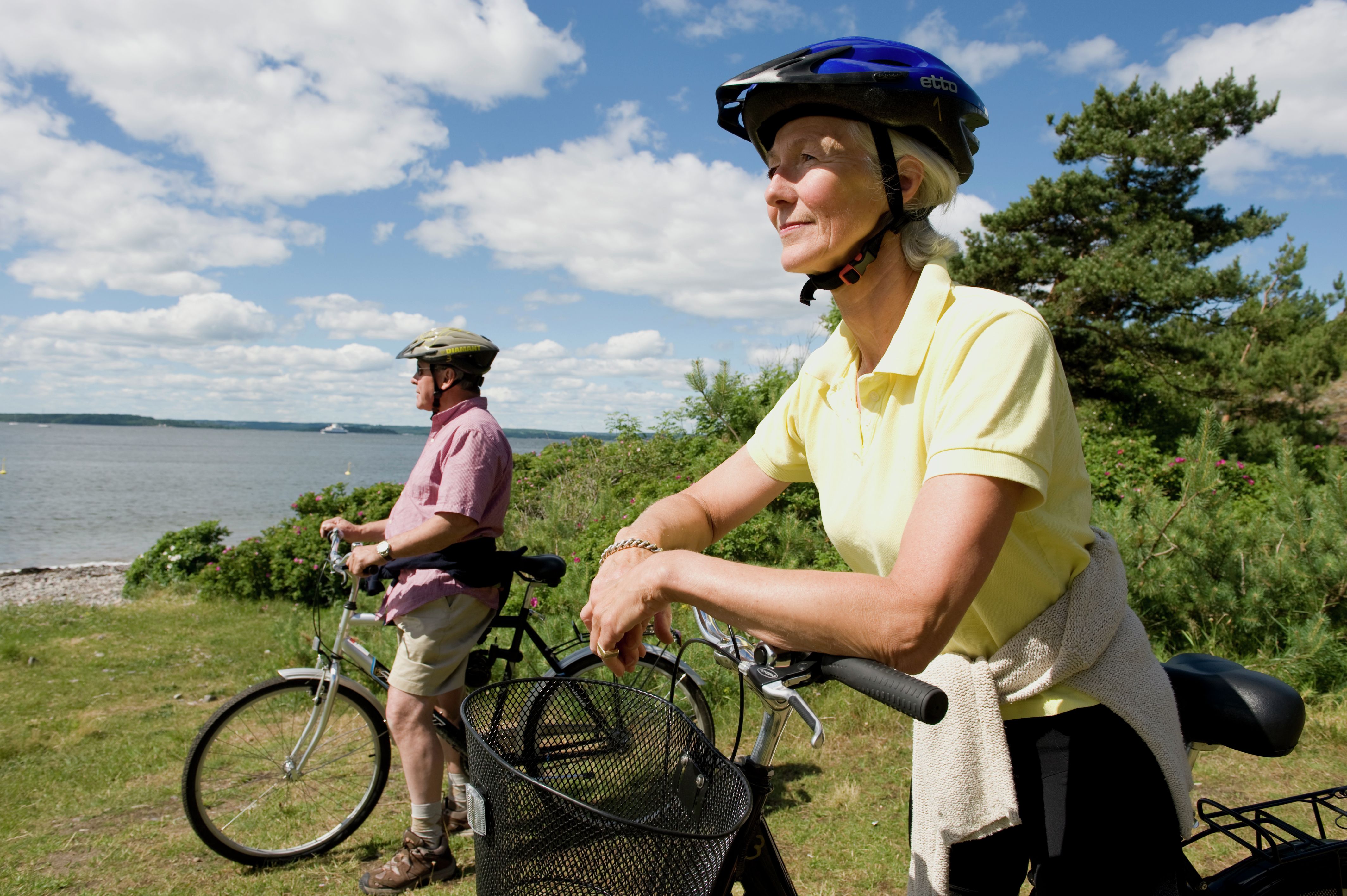 A couple resting with their bikes in Østfold, Eastern Norway