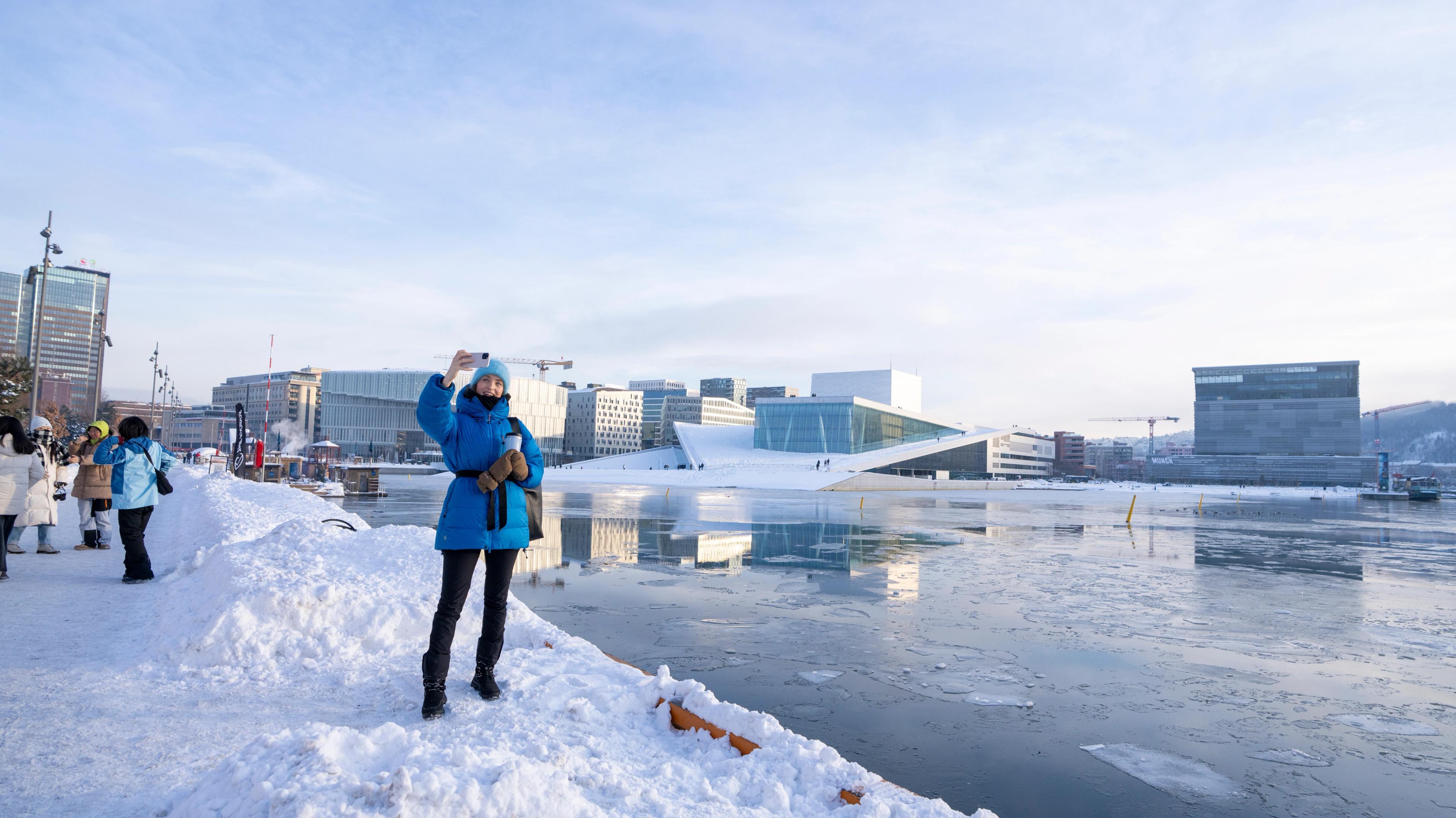 Woman taking selfies in Oslo