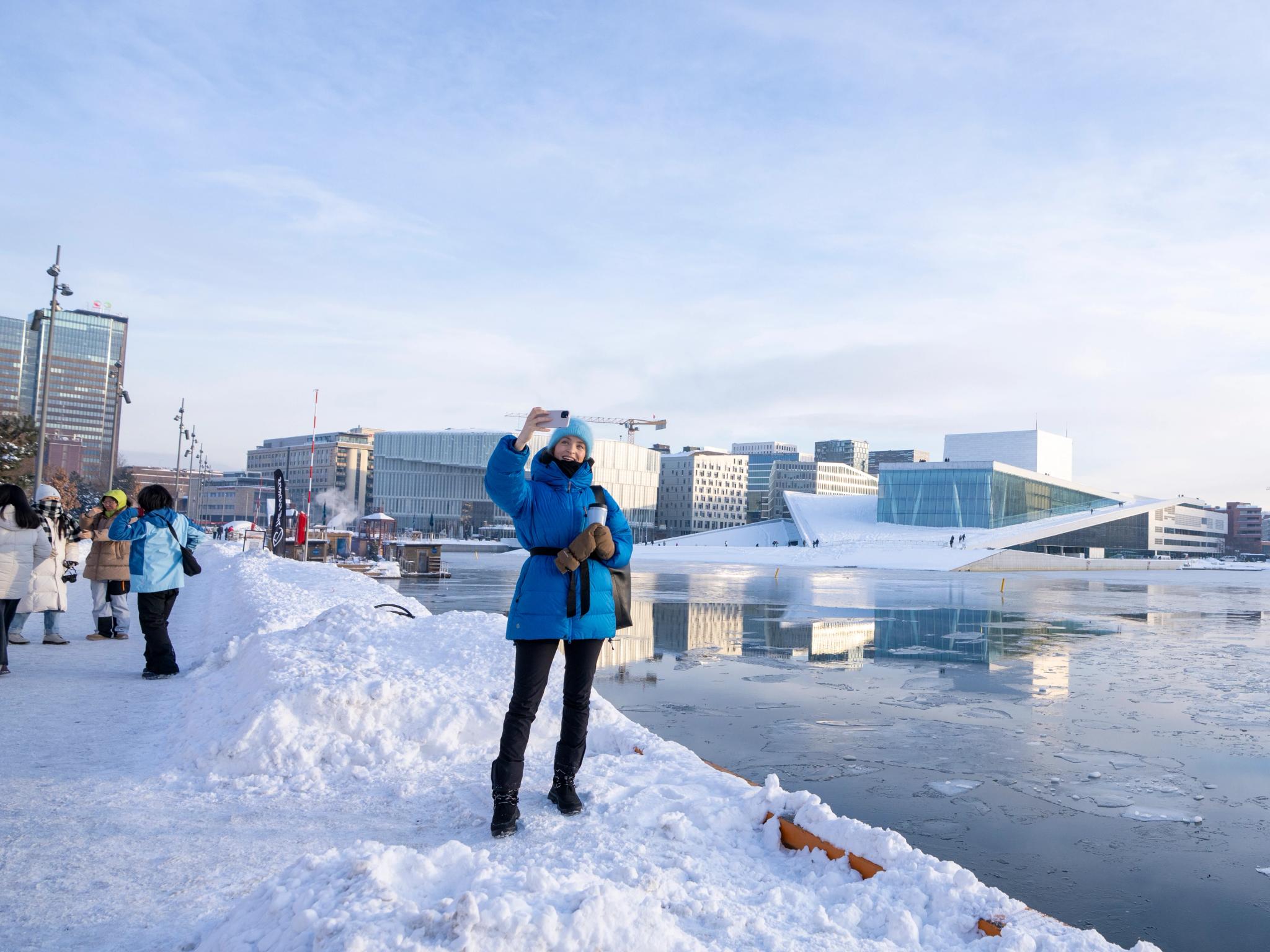 Woman taking selfies in Oslo