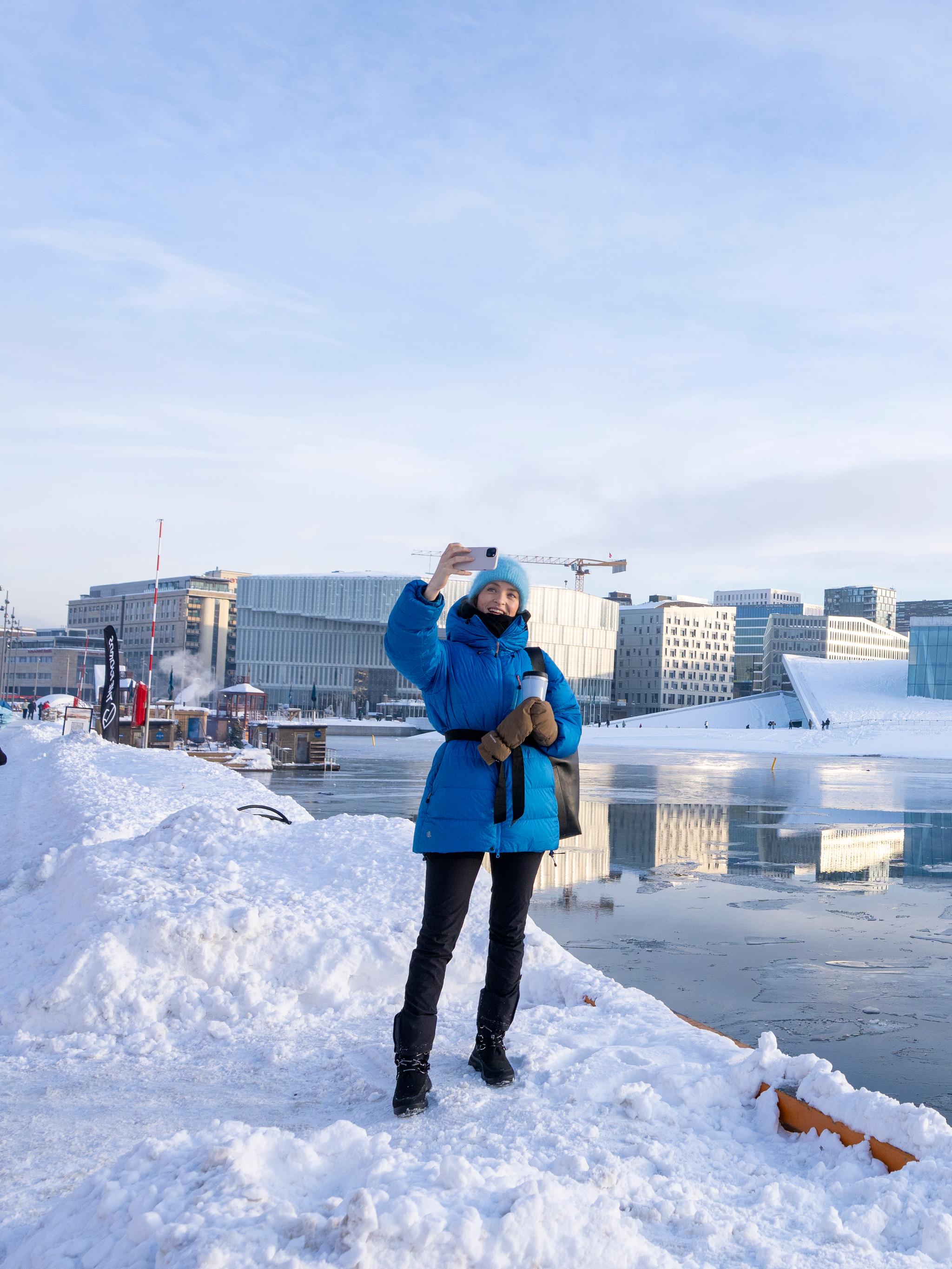 Woman taking selfies in Oslo