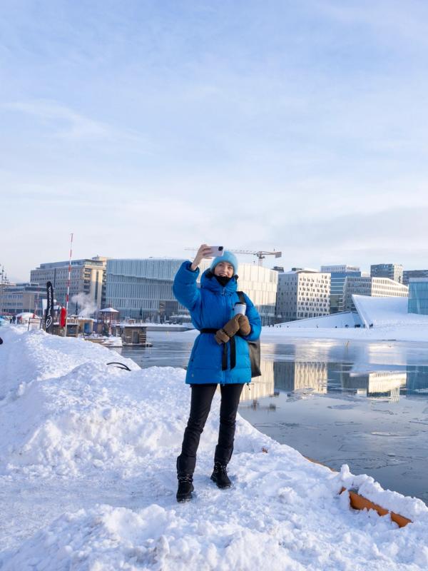 Woman taking selfies in Oslo
