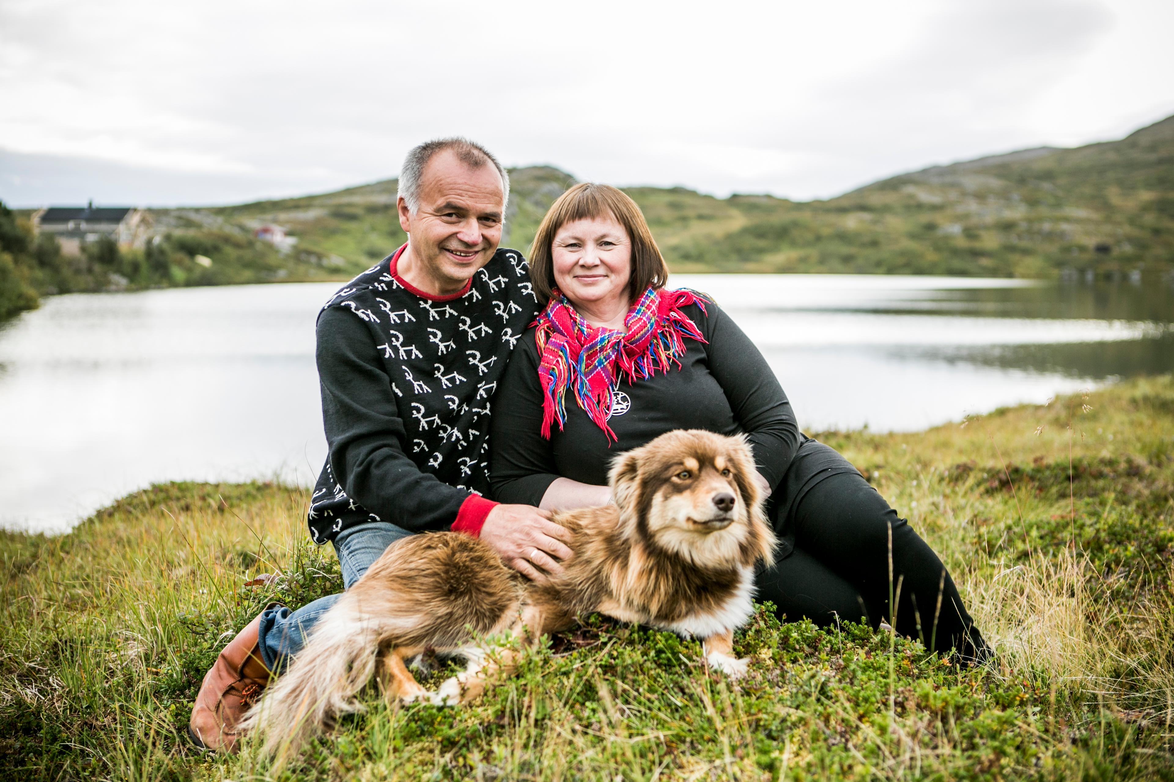 A Sami couple with a dog