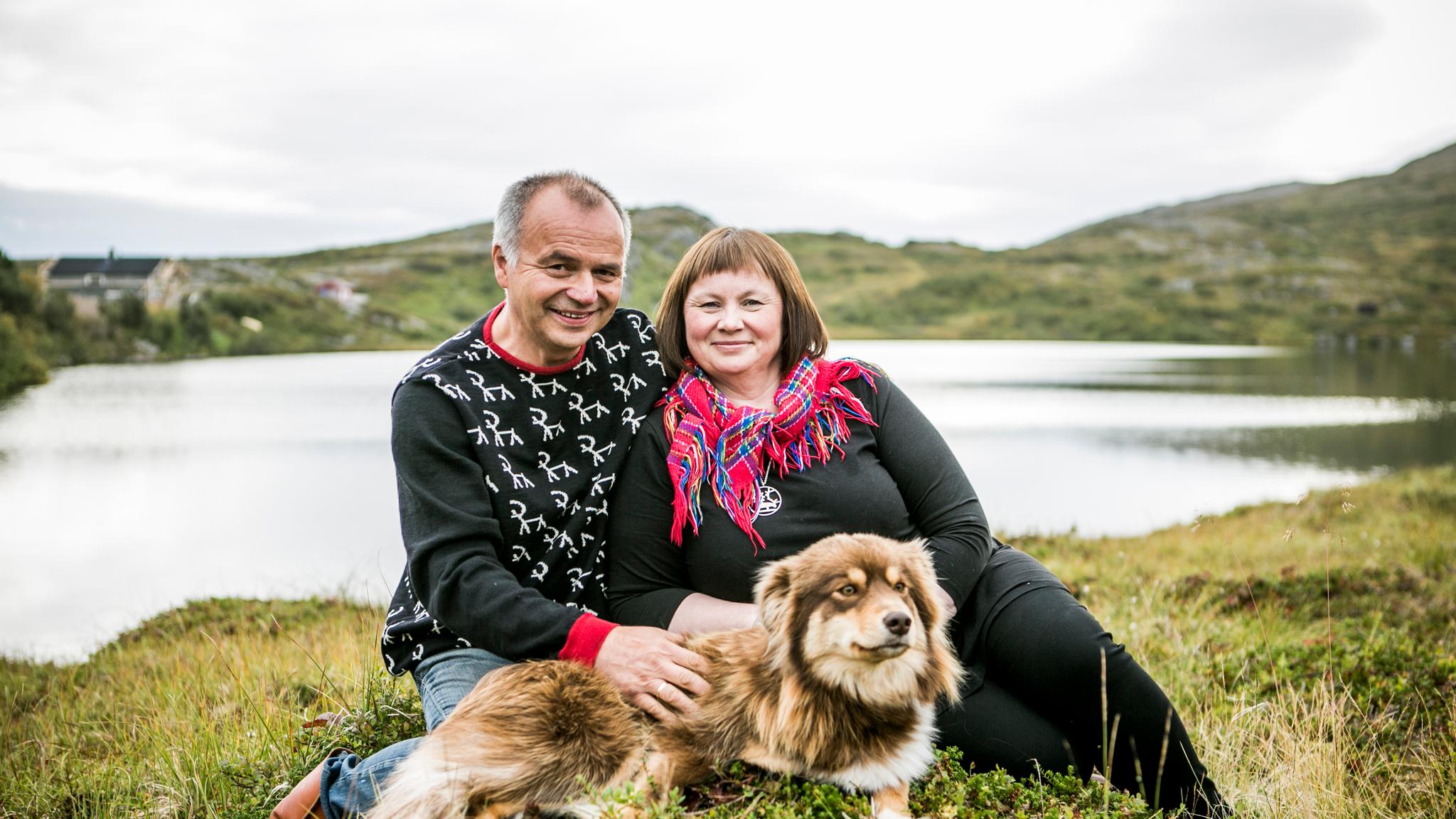 A Sami couple with a dog