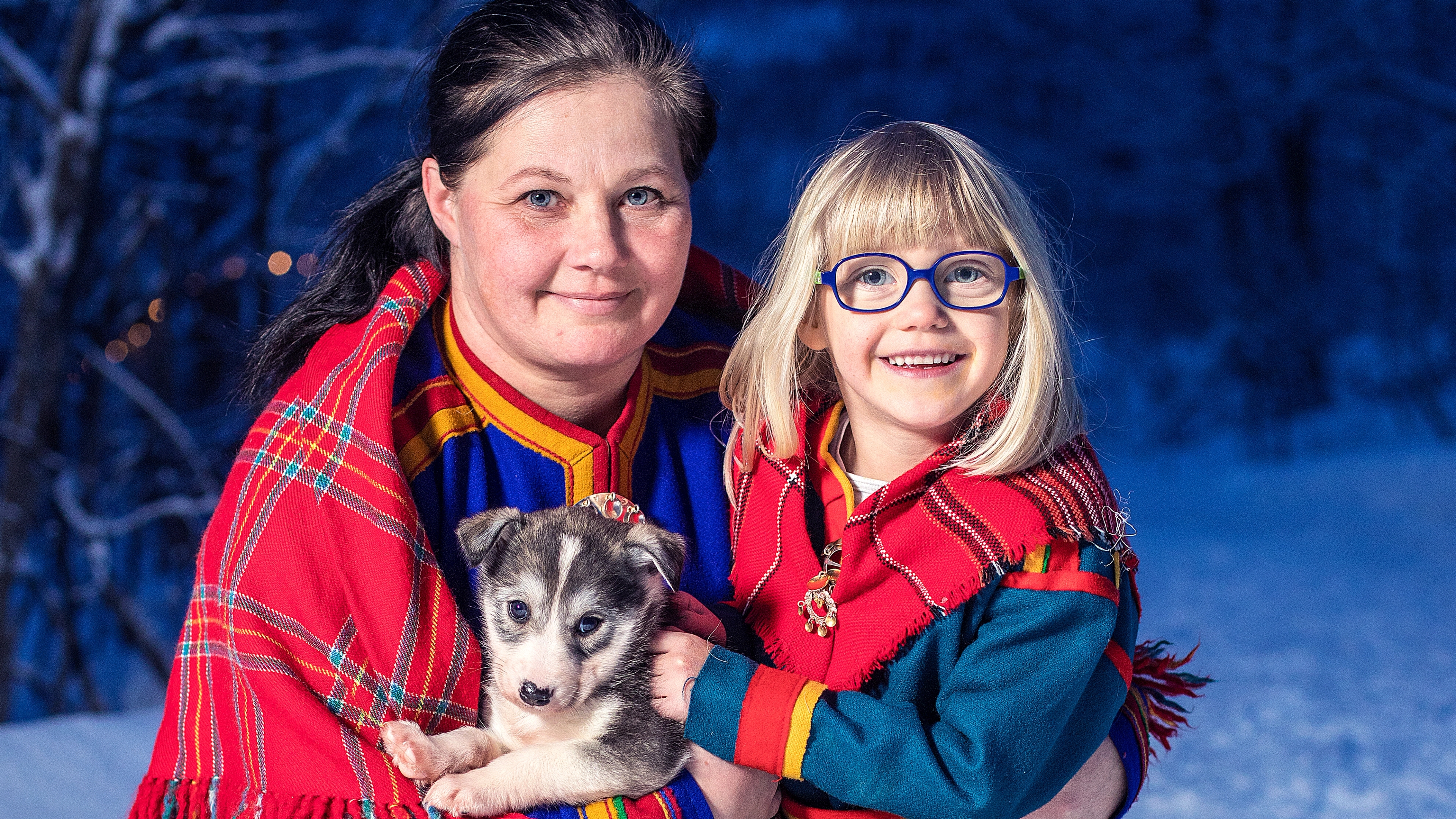 Mother and daughter in traditional Sami clothing in Narvik, Northern Norway
