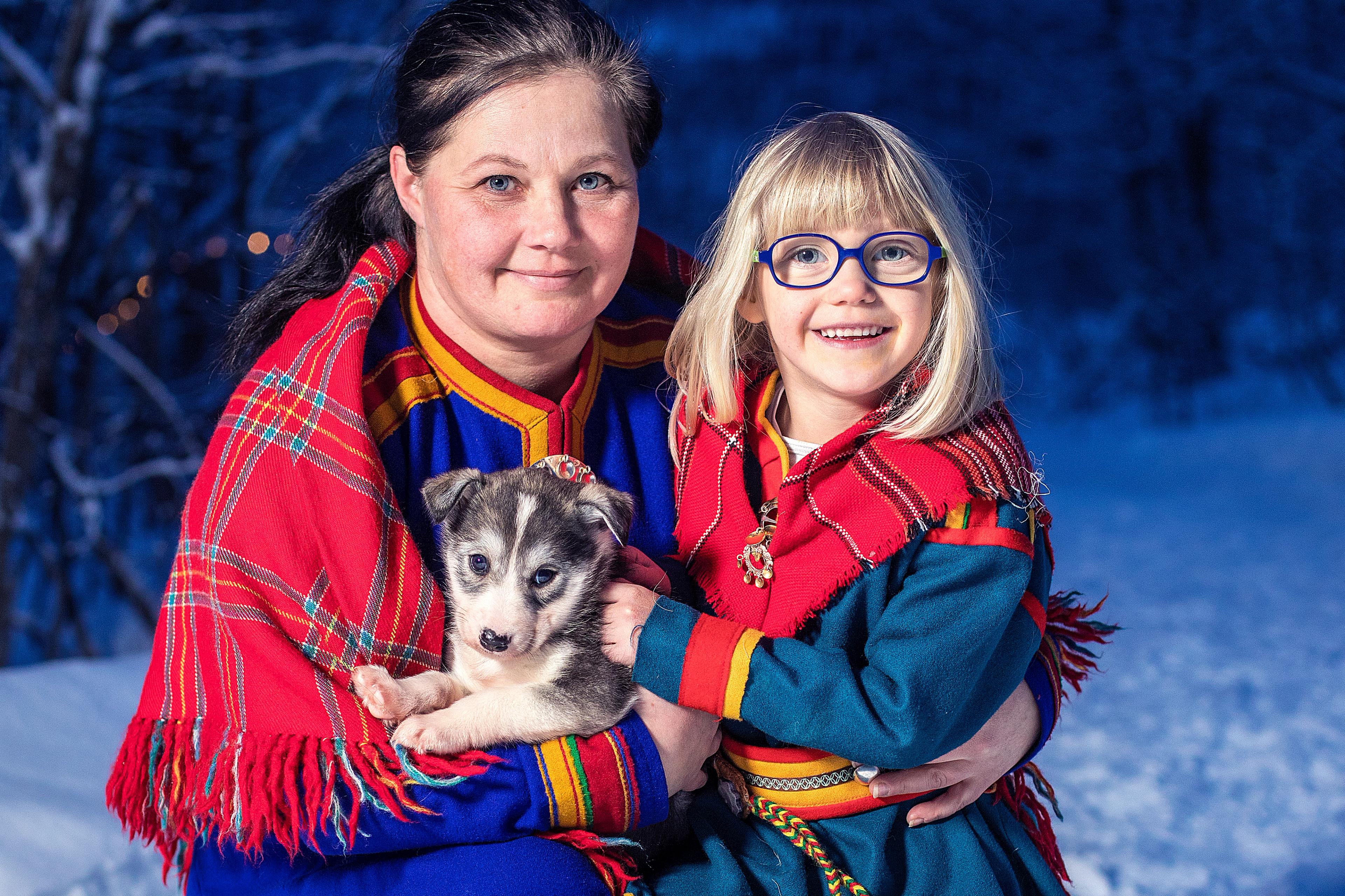 Mother and daughter in traditional Sami clothing in Narvik, Northern Norway